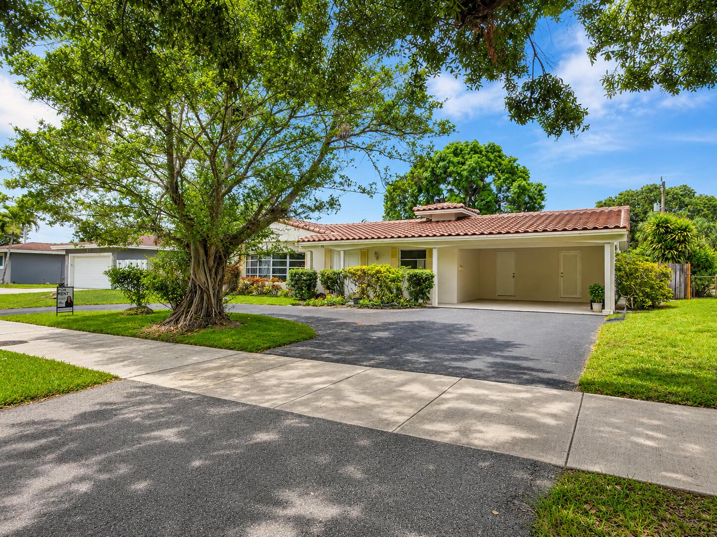 Rare 5-bedroom, 3-bath Mid-Century Modern pool home featuring two primary suites and approximately 2,700 square feet of living space. Bright, open floor plan with stainless steel appliances, spacious living areas, and multiple sliding glass doors leading to the screened pool and fully fenced backyard. Located on a beautiful tree-lined street with wide sidewalks and within walking distance to parks. Conveniently located just minutes from downtown Fort Lauderdale, major universities, shopping, dining, and the beach. Pool and lawn maintenance are included in the rent. Tenant must have proof of renter's insurance prior to lease signing.