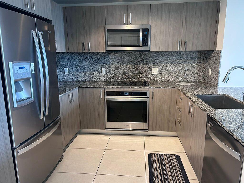 Welcome to this Beautiful 2-Bedroom 2-Bathroom condo in the heart of Doral. This modern & luxurious Downtown Doral residence provides a sophisticated Urban Lifestyle, offers high-end residential luxury with a vibrant social & business environment. Miami at its best. Walk to upscale dining or casual dining, shops, grocery stores, banks, pharmacies & entertainment.  Amazing location in the most vibrant area in Doral, renowned restaurants and convenience at your fingertips. Be close to parks, schools, golf courses, nightlife, coffee shops, bars, supermarkets, among others.  Authorized for Short-term Rentals and Airbnb. This 2-BD 2-BA condo allows the space to be divided in two independent units to maximize profitability, each with its own main door access.   One Unit is a complete 1-BD 1-BA condo with kitchen and ample spaces, and the other Unit is a beautiful modern room with its own bathroom as a hotel room.  Impact windows, Floor-to-Ceiling windows, One assigned Parking Space.  Great pool area with large sundeck, gym, business center, children's playroom and 24/7 security, sauna and massage room, steam room, mini golf, resort style living! 24 hours concierge, designer lobby and valet parking.  Inviting natural light floods into the condo spaces, S/S appliances, in-unit washer and dryer. Relax indoors or enjoy the amazing view at the balcony!  WATER, CABLE and INTERNET included in HOA. Across downtown Doral Park, easy access to 58th Street, 87th Ave, Doral Blvd, Palmetto Expressway to the east, and Florida's Turnpike to the west.