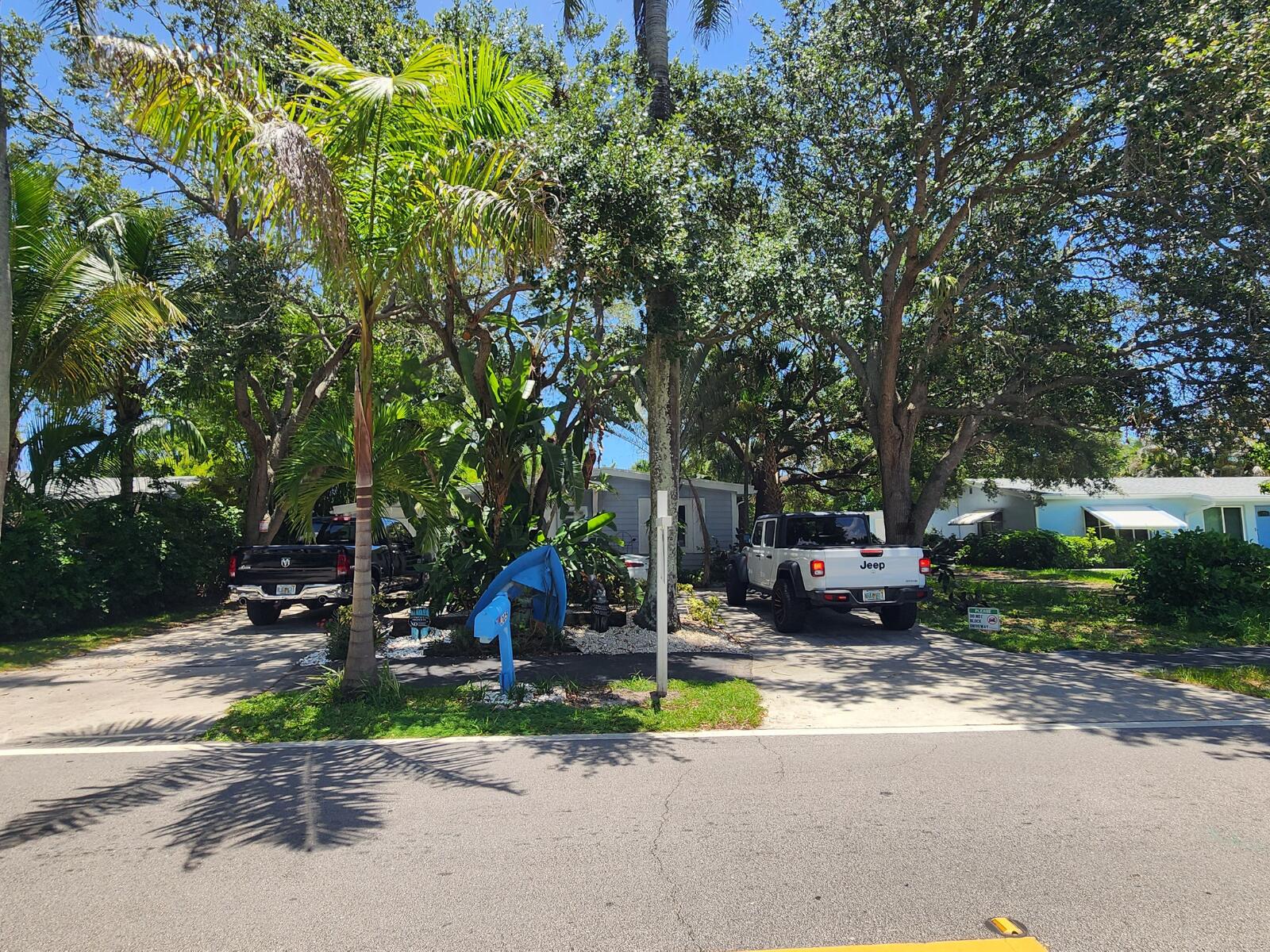 Charming 3-bedroom, 1-bath beach-style home located in the desirable 33458 area of Jupiter. Freshly painted interior, new laminate flooring in select areas, and a beautifully updated kitchen featuring brand-new cabinets and quartz countertops. Just 8 minutes from Jupiter Beach, this home is surrounded by mature tropical landscaping that enhances its peaceful setting. Conveniently located near Jupiter Elementary School, shopping, restaurants, parks, and with easy access to major roads. The backyard is shared, and privacy improvements are currently underway, including landscaping and renovations designed to provide a more private outdoor space while preserving the home's charm.