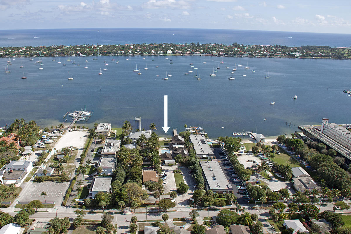 This spectacular 1.2 acre direct waterfront site has 100' of seawall, an existing large boat dock, a large pool, an 18' deep dive tank and numerous existing building/structures.  Operated as the Scuba Club for over 40 years the sale includes the unique operating licenses to allow for Adventure Trips/Fitness Center use which no longer exists along this portion of the coast line.  More importantly the site is approved through the City of West Palm Beach for a beautifully designed 28 unit condominium with unbelievable amenities including multiple private boat docks, roof top decks and two car covered parking, private elevators and a fabulous waterfront swimming pool.  You can build your dream home on this site, you can operate a ''club'' type business, or you can build 28 condos! Call for the details.