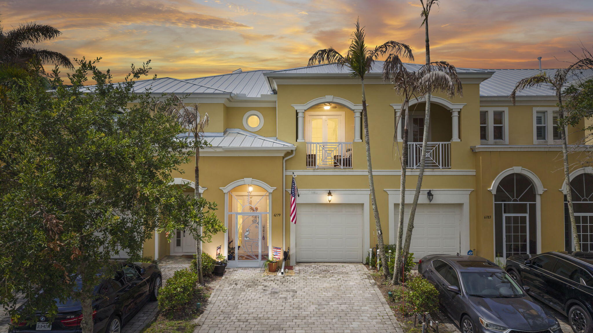 Welcome to this beautiful townhome in the desirable St. Andrews community within St. James! Featuring a brand-new metal roof installed in '26, this well-maintained home offers 2 spacious bedrooms & 2.5 bathrooms.  The kitchen is designed for both style and function, boasting granite countertops, abundant cabinetry, and plenty of storage space. Just off the living area, enjoy a screened-in patio perfect for relaxing with your morning coffee or unwinding in the evening.  Upstairs, you'll find two generously sized bedrooms, each with its own private bathroom. The spacious primary suite offers enough room for a home office, sitting area, or reading nook, along with a private balcony overlooking the beautifully maintained community.  Residents of St. Andrews enjoy access to an impressive clubhouse featuring resort-style amenities, including a sparkling pool, fitness center, and inviting lounge areas. This townhome combines comfort, convenience, and an exceptional lifestyle in one of the area's most sought-after communities.