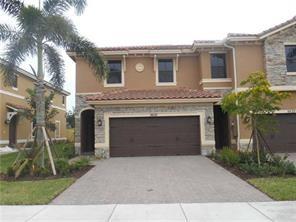 End unit 3 Bedrooms 2.5 baths Alahambra model. Neutral tile downstairs, extended pavers and ready for you to make it your own. Parkland care free lifestyle at it's very best! Guard gated community. Enjoy all ages amenities inside of Town Parc with pool, play park and at the Club House at MiraLago with ballroom, billards, pool, splash park, gym , tennis etc. and there is more at Cascata Sportsplex, indoor basketball, tennis, lap pool, gym etc.  Private yard larger yard for the community. Capital contribution of $1000 from buyers to Town Parc @ Mira Lago.