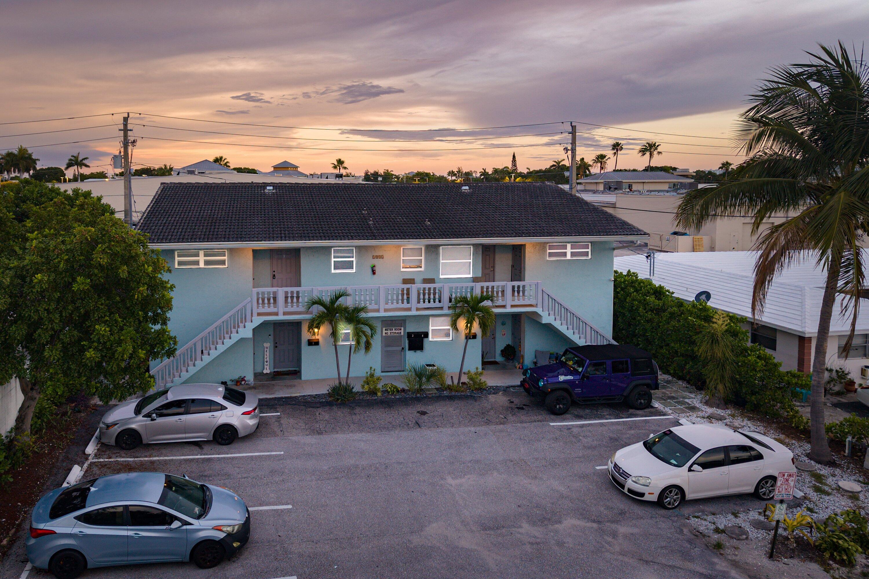 Substantial two-story quadruplex located in The Cove, Downtown Deerfield Beach, Florida. Offering 4,653 square feet above grade, this multi-unit property presents significant income-generating potential or investment opportunity as a tradition rental but especially as a short-term rental property (Airbnb, etc). All units are large 2-bedroom, 2-bath floor plans with modern kitchens and bathrooms. Large common laundry room downstairs. Thoughtful two-story layout provides flexibility for various uses and configurations. Positioned in an established Deerfield Beach location, this property offers convenient access to local amenities and services. This quadruplex represents a solid investment opportunity for those seeking a multi-unit residential income property.