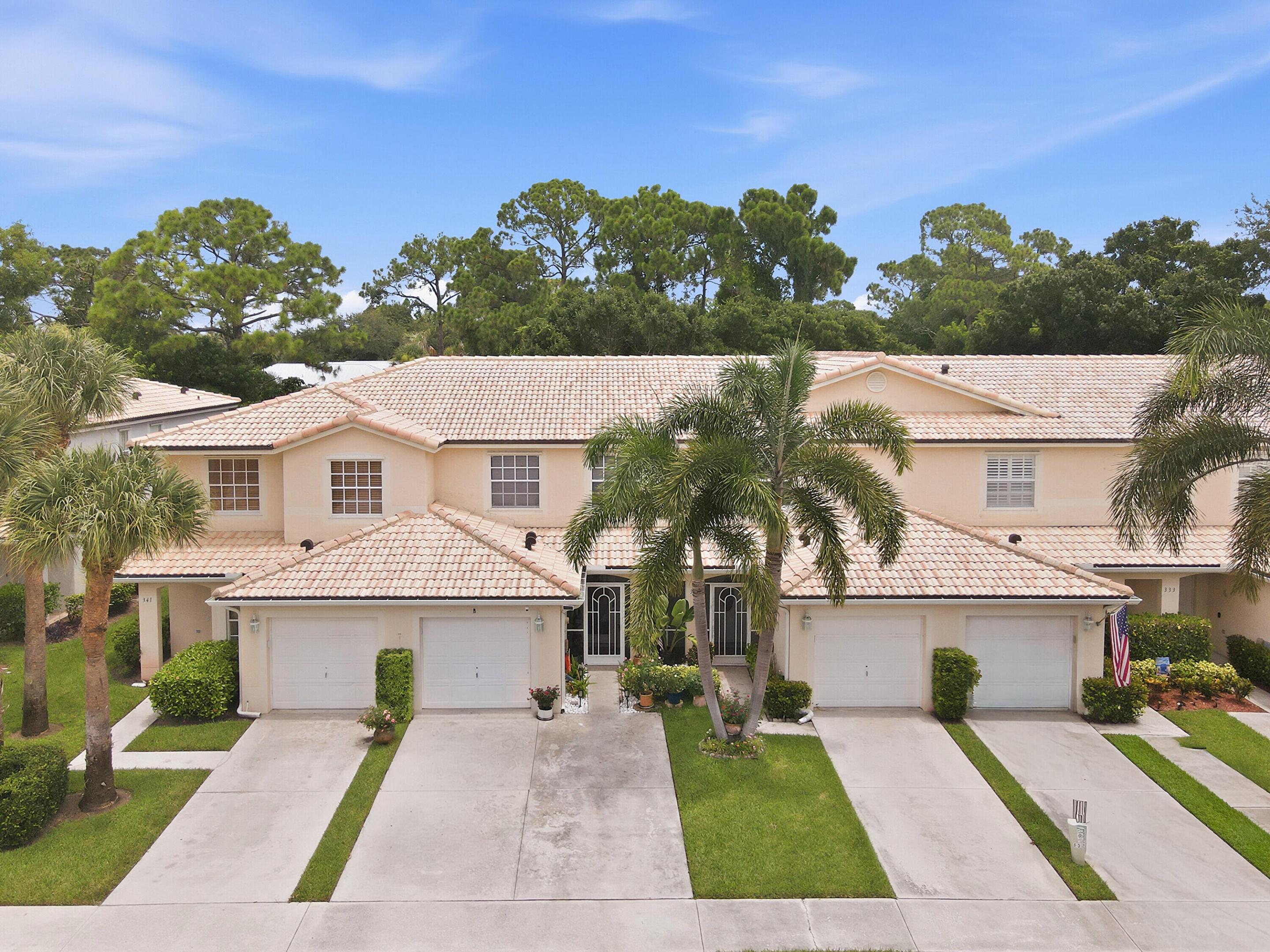 Gorgeous 3br, 2.5 bath, 1 car gar. renovated townhome in the desirable gated community of Timberwalk in Jupiter, FL. This move-in-ready gem features stunning new tile floors that flow seamlessly through the open living spaces, creating a bright and modern feel. The highlight is the updated kitchen, featuring beautiful quartz countertops that provide both elegance and functionality. New stainless-steel appliances make meal prep a joy. Enjoy ample counter space, modern cabinetry, and a breakfast bar, perfect for casual dining. Upstairs, 3 generous bedrooms offer comfort and privacy, complemented by updated bathrooms. Outside, enjoy your private screened patio—great for morning coffee, evening unwinding, or al fresco dining. Fresh paint, modern lighting, and thoughtful updates throughout ensure everything feels brand new. Timberwalk offers many amenities including a community pool, clubhouse, and playground, all Just minutes to world-class beaches, shopping, dining, top-rated A--rated schools, and easy access to I-95, FL Turnpike and 2hrs from Orlando! #ComeJoinUs and #LoveWhereYouLive