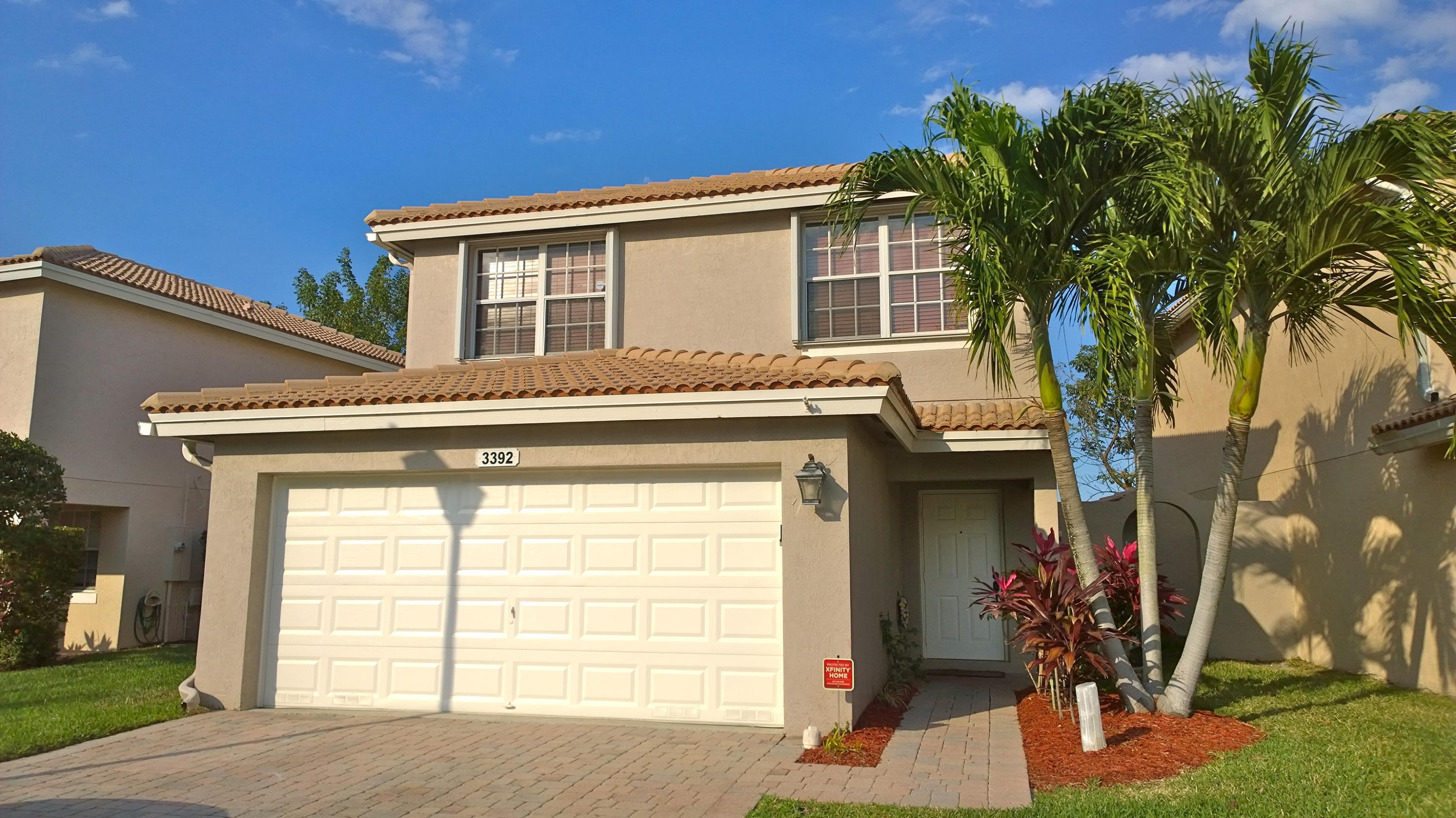 Welcome to this move-in-ready 3-bedroom plus loft, 2.5-bath lakefront home in Liberty Bay. Freshly painted, this nearly 1,800-square-foot home offers direct lake views, a two-car garage, a new 2026 Wi-Fi-enabled HVAC system, complete accordion shutters, an owned solar water-heating system, a Wi-Fi-enabled smart irrigation system, and built-in closet organizers. The kitchen features newer black stainless steel appliances, including a side-by-side refrigerator and a large-basin stainless steel sink. The versatile upstairs loft provides flexible space for a home office, playroom, media room, or additional living area. Outside, enjoy a fully fenced waterfront backyard and an updated patio with quick-draining tiles. Community amenities include a pool, clubhouse, fitness center, playground, jogging paths, picnic areas, and sidewalks, with convenient access to shopping and dining.