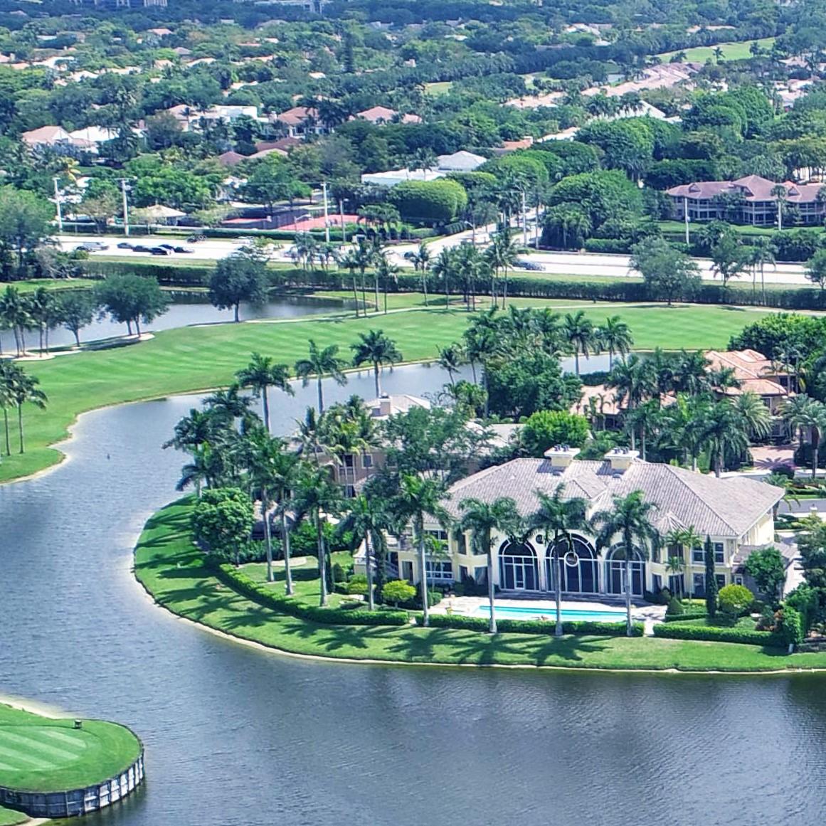Stunning Palm Beach style estate lakefront estate. Woodfield's crown jewel. Complete renovation.