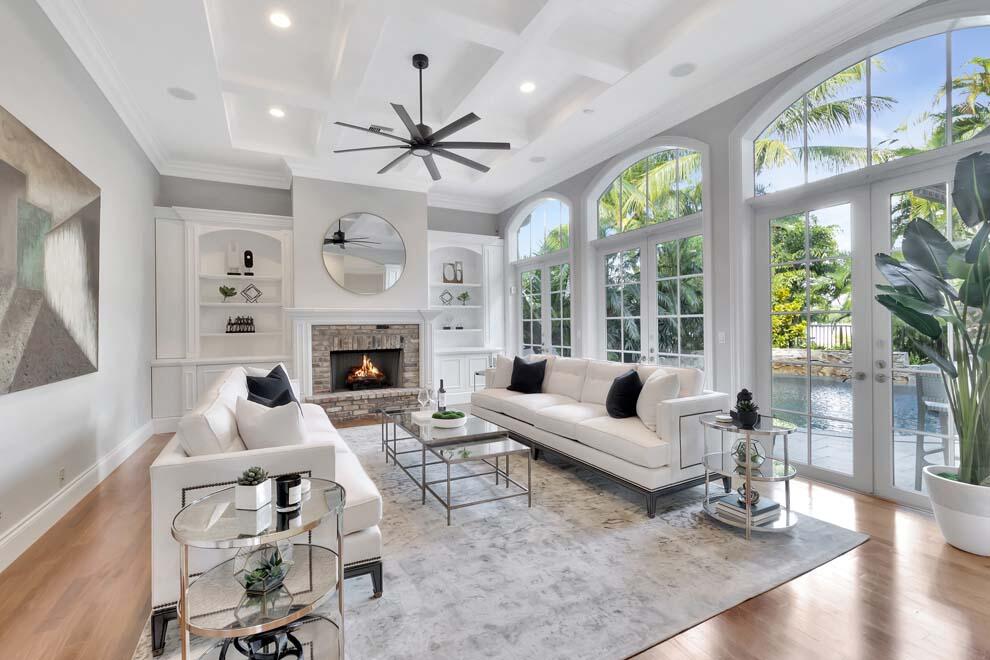 Situated a block and a half from the beach, this quality-built residence boasts the coastal Delray Beach lifestyle at its finest. The private courtyard entry leads you into a spacious interior that includes marble and hardwood floors, coffered ceilings, gourmet kitchen, elevator, dining room, naturally lit semi-formal and casual living rooms allowing for ample entertainment space. The well-appointed outdoor area offers a heated pool, spa, outdoor kitchen, covered loggia with retractable screens, TV and speakers. The primary suite features two walk-in closets, a newly remodeled bathroom and spa shower, and guest bedrooms are generously sized. Located just three blocks from Downtown Delray, and a short drive on A1A to Palm Beach or Boca Raton, this property is the ideal South Florida home.