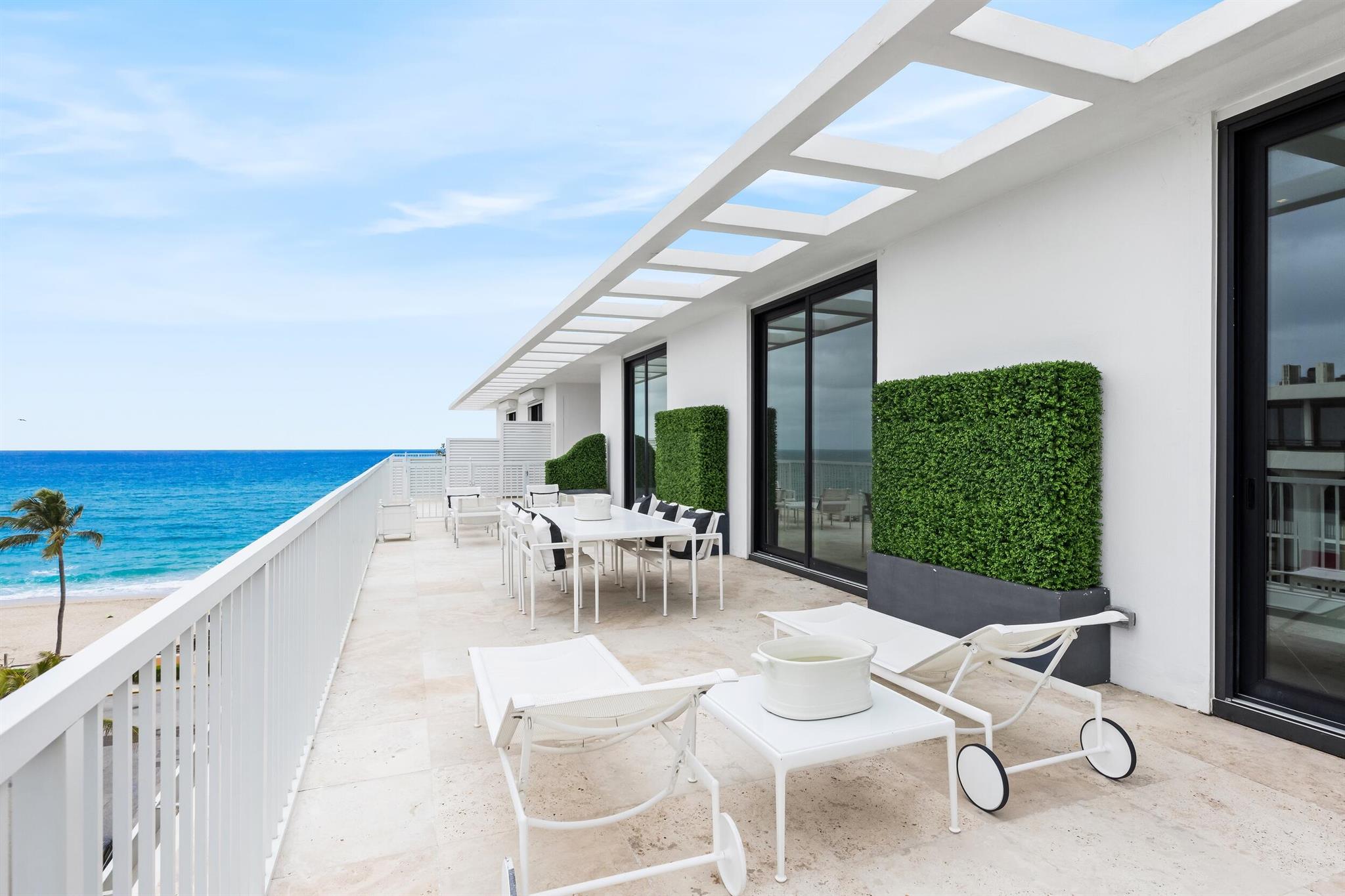 Stunning and pristine 2BR/2.1BA Penthouse apartment with beautiful ocean views. Gorgeously remodeled with clean lines and generous living spaces. Oversized balcony with stunning water and downtown views. Highlights include limestone flooring, impact windows, and gorgeous marble fireplace and detailing. Gourmet eat-in kitchen with marble chef's island. Fabulous full service Oceanfront building with full time management, beautiful central atrium with water feature, exercise room, club room, guest suites, and fabulous rooftop pool overlooking the ocean.