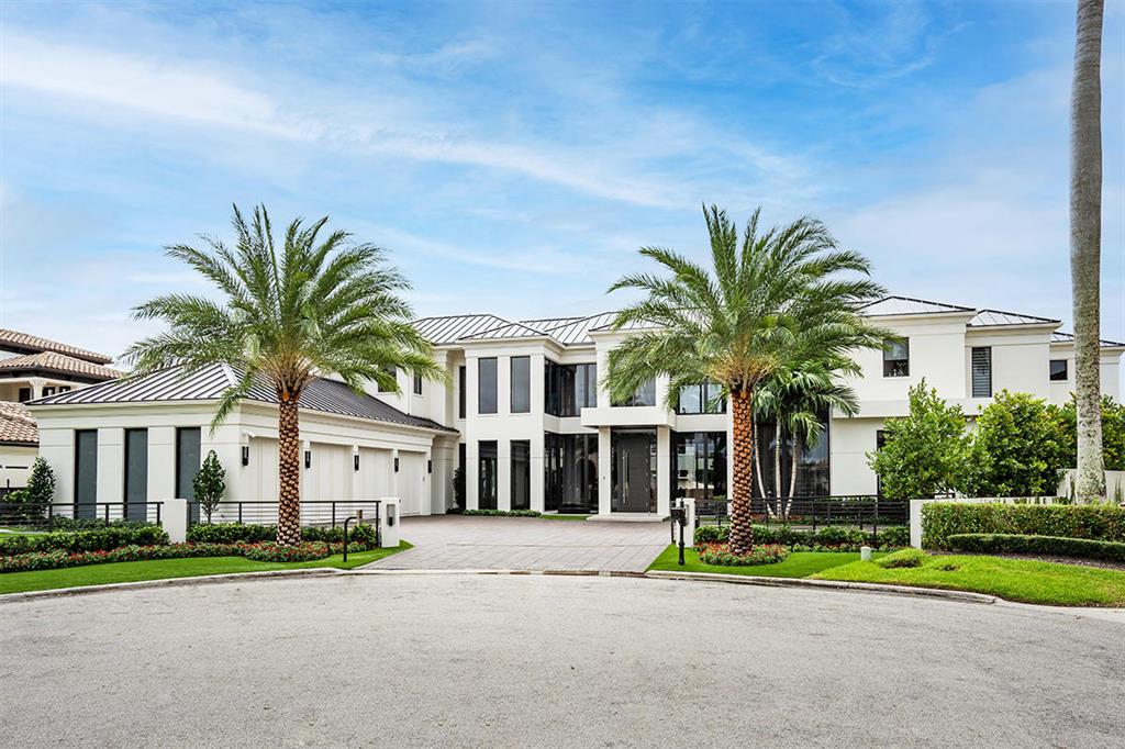 160 Key Palm Road is a new waterfront Signature Estate built by SRD Building Corp, to be completed in October 2020. This magnificent home sits on 177′ of the Butterfly Palm Waterway in Boca Raton's most sought-after community, Royal Palm Yacht & Country Club. The home features 5 bedroom suites, 6 full and 2 half bathrooms, 8,083 sq. ft. under air, and a 4-car garage. The large open floor plan has a formal living room, gourmet kitchen, formal dining space, clubroom with equipped bar and wine room, and a library. Other features include 1st and 2nd-floor laundry rooms, 2nd-floor media room, outside entertaining areas and a heated pool with sundeck and spa. Buyer to pay documentary stamp taxes on the deed and title insurance.
