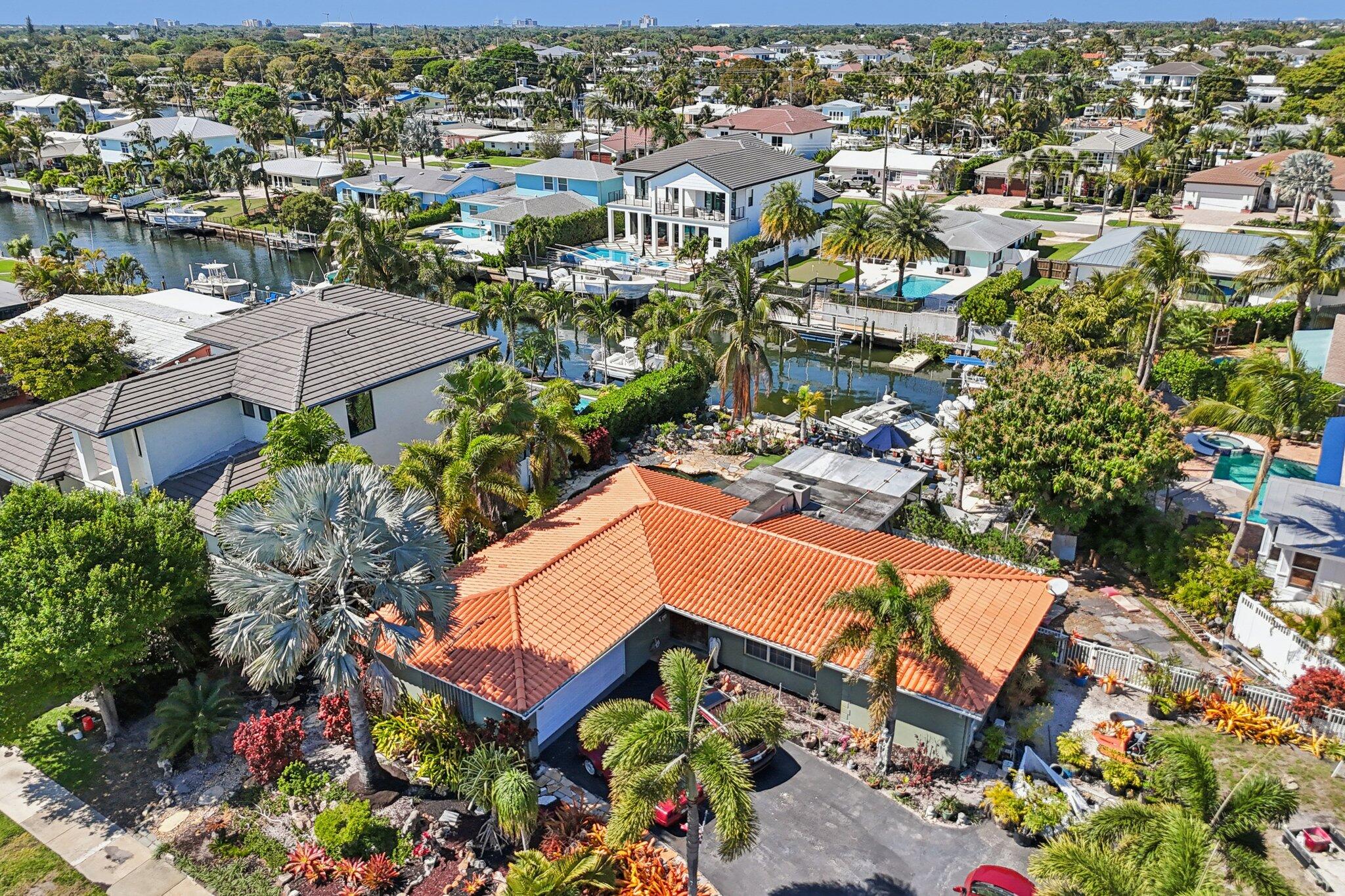 A rare waterfront parcel in one of the area's most sought after villages of North Palm Beach. Offering 75 feet of direct waterfront frontage with the ability to accommodate a 60 foot boat, this expansive .37 acre pie shaped lot provides the scale, privacy, and boating capacity that are increasingly hard to find. Whether you're envisioning a luxury remodel or planning to build a brand new custom estate, this property delivers the premier location and waterfront footprint to bring that vision to life. From here, you can take your golf cart to Anchorage Park, the North Palm Beach Country Club, nearby restaurants, and local shops, everything is just minutes away. Families will appreciate the convenience of being only a short drive to The Benjamin School, one of the area's top private schools.
