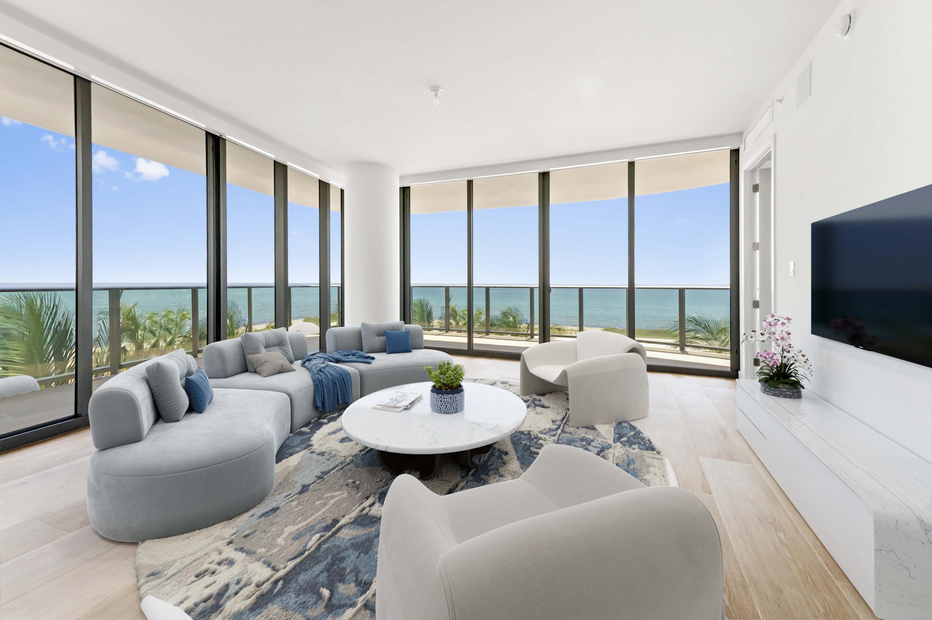 Prepare to be captivated by this newly built, expansive condo at Casamar, where luxury and breathtaking ocean views come together in perfect harmony. This stunning residence offers 3 bedrooms and 3.5 bathrooms, providing an abundance of space and privacy, finished with an upgraded technology package and automated blinds. This unit has been updated with custom light fixtures and built in closets to allow you to move right in! Enjoy the convenience of your own private storage unit on your floor. The living area is a true masterpiece, with floor-to-ceiling windows that flood the space with natural light and showcase incredible panoramic views of the ocean. An incredible wrapped balcony over 1,000sqft extends your living space, inviting you to enjoy the coastal breeze and the mesmerizing sounds of the waves.