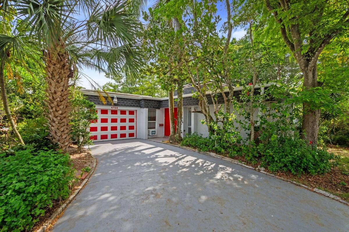 Welcome to this charming 3 bedroom, 3 Full bath "Banyan Model" situated in the Woodlands community. This single-story home offers 2,127 square feet of living space, providing ample room for comfortable everyday living. The thoughtful layout includes a freshly painted interior, Brand New laminate flooring in all bedrooms, Newer Roof w/solar panels installed 2024, 1 A/C unit 2023.  Centrally located, close to major highways, restaurants and shopping. This property presents an excellent opportunity for those seeking a well-proportioned home in an established community.
