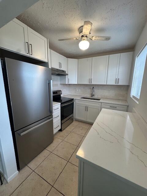 Welcome to this charming two-bedroom, one-and-a-half-bath condominium in the active 55+ community of Century Village in West Palm Beach. This well-proportioned residence offers CENTRAL AC and a BRAND NEW KITCHEN, all tile flooring and second floor corner access. Screened balcony / Florida room. Community offers retirement lifestyle living with clubhouse, 1200-Seat Theater, Health & Fitness Center, Tennis Courts, Shuffleboards, Billiards, Zumba, Yoga, Massage Therapist And Personal Trainer On-site, Courtesy Bus, 24-Hour Security and so much more!