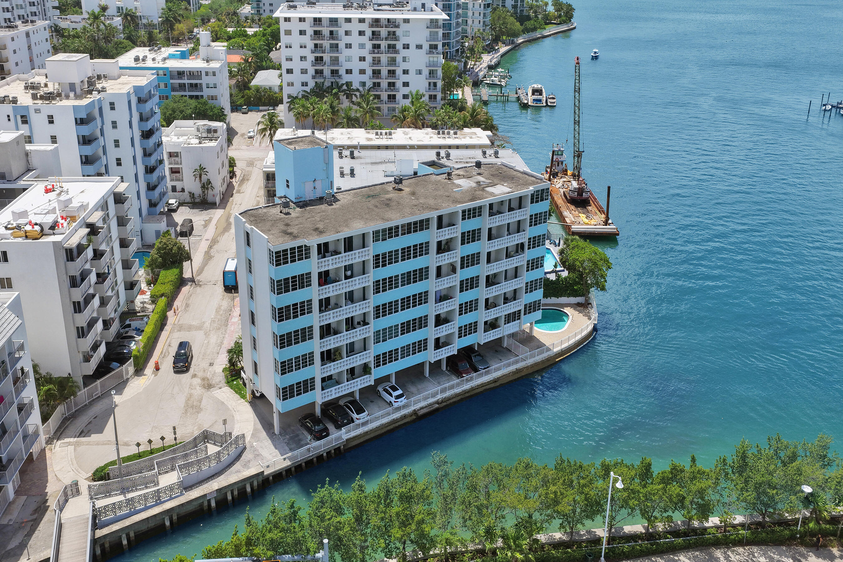 Prime waterfront location ideally situated between Lincoln Road and Sunset Harbor. This boutique building of just 30 residences offers a rare setting directly on the water. This fully renovated one-bedroom offers beautiful marina and bay views, including from the spacious primary bedroom. Offered fully furnished and turnkey, the unit features an open kitchen with a large island and bar seating, white porcelain tile flooring throughout, and new impact windows and doors. Call us now to book your showing!