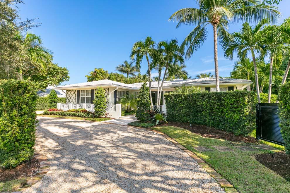 Amazing Gulf Stream home on corner lot. Great living areas and spacious grounds with pool and terrace.
