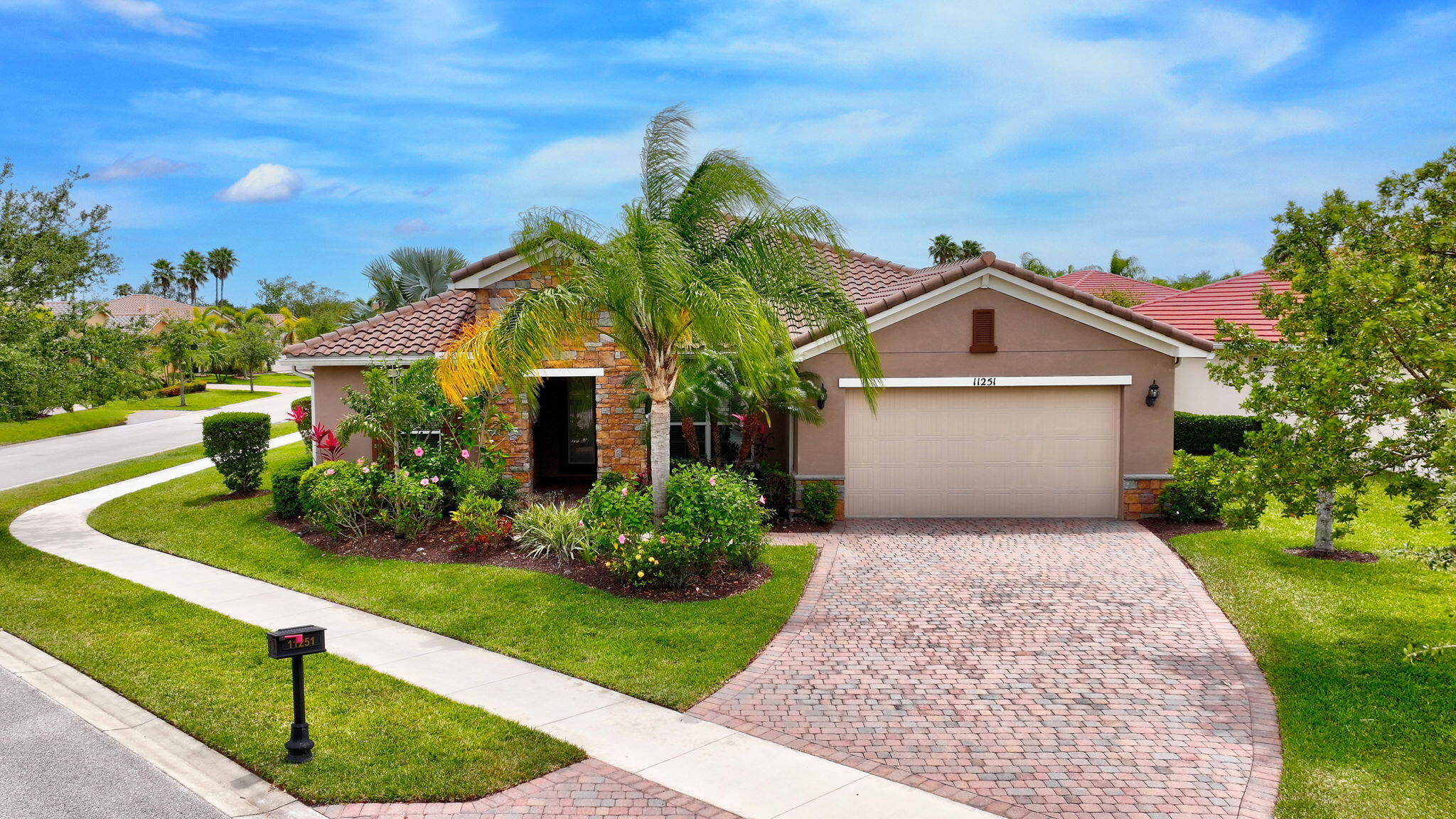 This beautiful home features four bedrooms, three bathrooms, and a spacious den, all located within the desirable 55+ community of Vitalia. With 2,566 sq. ft. of living space, it stands out as one of the larger homes in the community.
The property includes an expanded garage and driveway, offering ample parking and storage space. An enlarged screened-in lanai provides an ideal setting for outdoor enjoyment and relaxation.
The home is equipped with natural gas, supplying a gas stovetop, gas dryer, and a gas hot water heater that was updated in 2021.
Situated on a generous corner lot, this home avoids the limitations of a zero lot line, offering added privacy and outdoor space. Vitalia boasts a wealth of amenities for residents, which can be explored along with all community documents at at vitaliaattraditionhoa
Inside, the home features impressive vaulted ceilings of 10 and 12 feet, creating an open and airy atmosphere. Tile floors extend throughout the main living areas, while all four bedrooms are comfortably carpeted. The gourmet kitchen is open to the living space, making it perfect for entertaining family and guests.
This exceptional home is ready for a buyer seeking comfort, style, and a vibrant community lifestyle. Should you also desire entertaining Family or Guests the split plan provides your privacy while enjoying your company. The generous space and bedrooms can be utilized for whatever you may desire providing the buyer the flexibility to making this home their own.
Vitalia is located close to shopping, dining, and a new hospital via the nearby back resident gate which also provides you with easy access to all the highways.