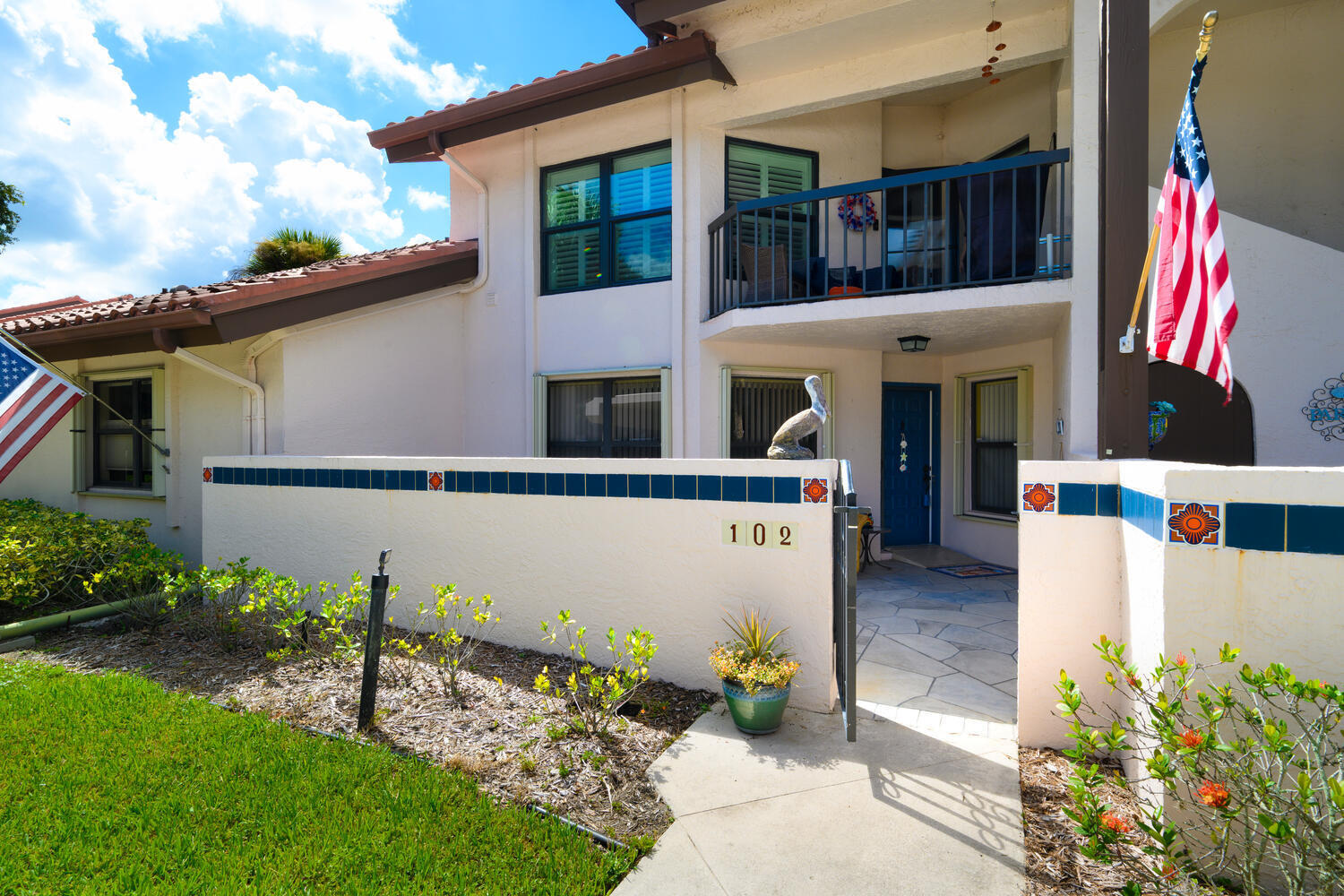 This is an updated, fully furnished two-bedroom, two-bathroom condo located in Montego Cove, a community for residents aged 55 and older. The condo features a spacious courtyard patio and an enclosed porch offering lake views. It has newer luxury vinyl tile (LVT) flooring and an updated kitchen with granite countertops. The generous living and dining area provides ample space for relaxation and entertaining. The primary suite includes walk-in closets, and the condo is equipped with storm protection featuring accordion hurricane shutters. Community amenities include two swimming pools, tennis and pickleball courts, and a clubhouse for social activities. Conveniently situated near downtown Stuart, this location offers easy access to US-1 shopping, local beaches, and medical facilities.