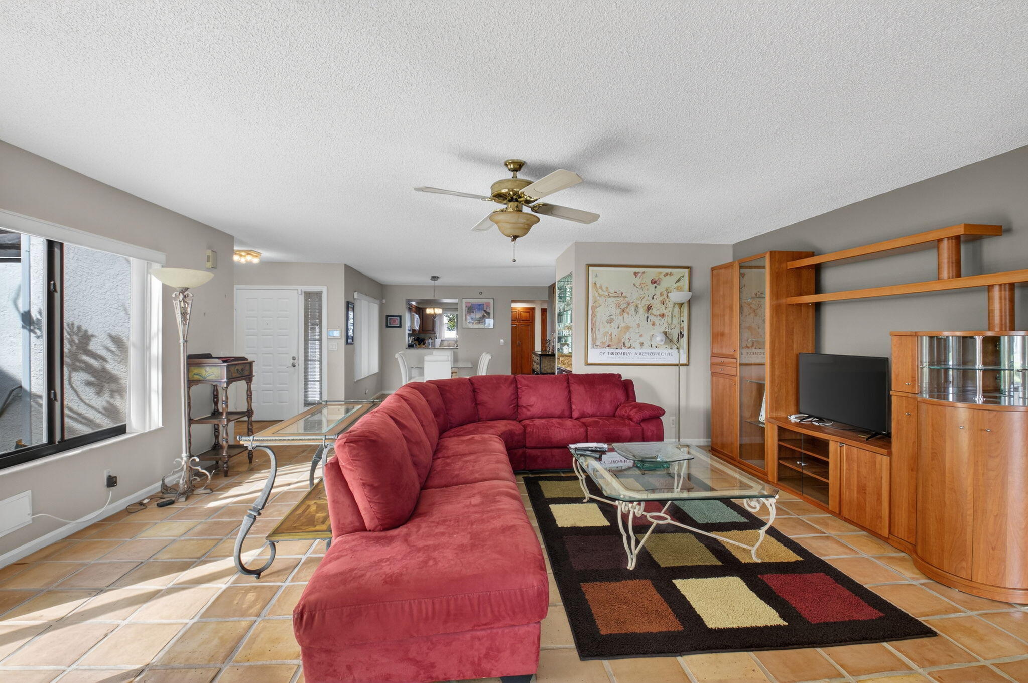 Much sought after first floor Bobby Jones model 2 bedroom 2 bath plus den overlooking tranquil lake and fountain. Walk to main clubhouse and facilities. Unit has impact windows, and comes completely furnished. Club has two golf courses, 19 tennis courts, pickleball courts, state of the art fitness center and spa. 8 swimming pools, 2 eating area, 2 bars, card rooms, community room, and much more. must join club.