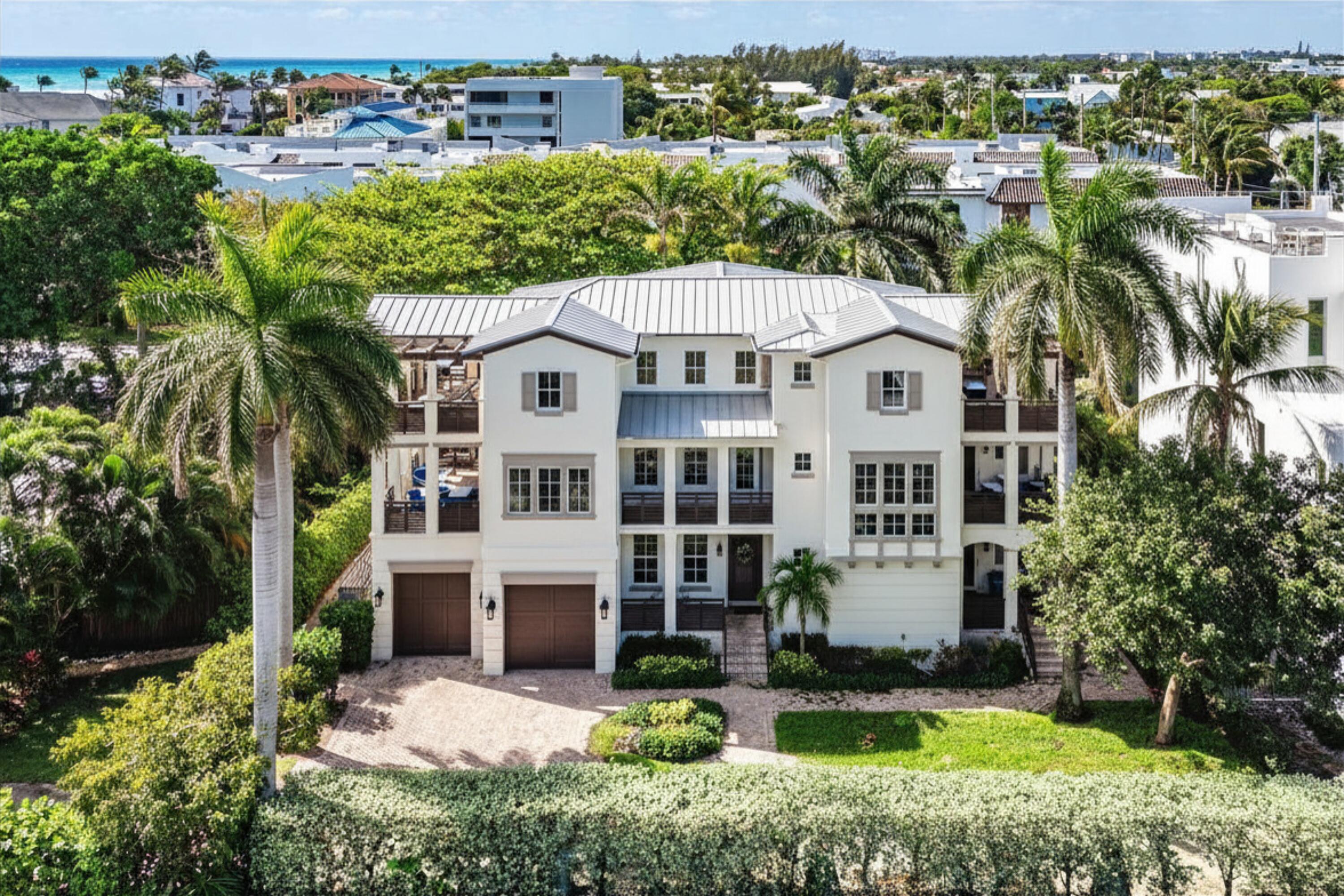 Incredible beach area opportunity! Private, 4-bedroom single family home on a quiet dead-end street of just four residences, perfectly positioned two blocks from Atlantic Avenue and half a block to the beach. Built in 2011 with all impact windows and a 2025 metal roof, this is one of the most compelling opportunities on the barrier island. Designed for both everyday living and entertaining, the home features two separate living spaces, four bedrooms with ensuite bathrooms, elevator access to all floors, and ocean views from the primary suite. Seven covered balconies and terraces create incredible indoor-outdoor living on every level, complemented by a private pool and 2-car garage. Your perfect Delray Beach home awaits.  This is one of those rare homes that truly needs to be seen in person to appreciate the privacy, scale, location, and overall value. Steps to the sand, moments to dining, shopping, and everything Delray Beach has to offer.