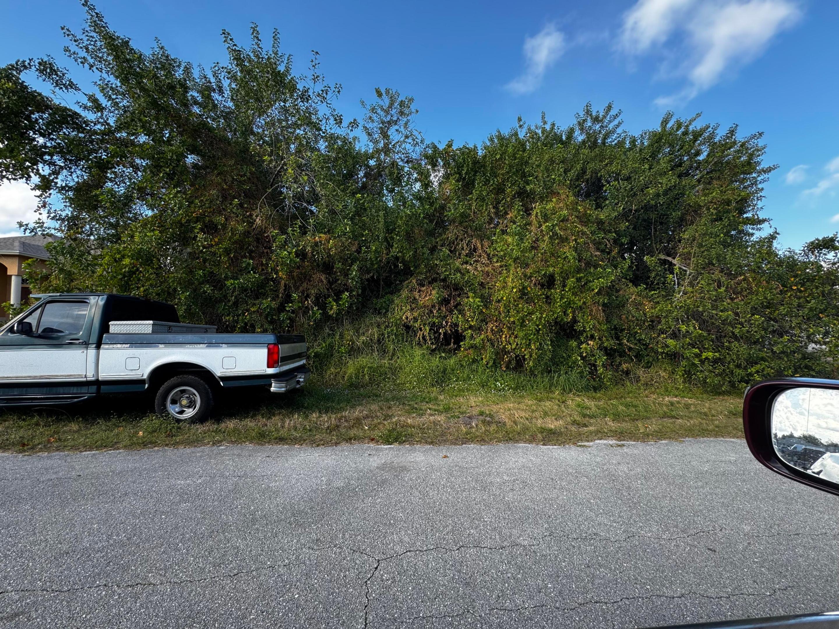 Vacant .23-acre residential lot located in an established area of Port St. Lucie. Zoned for single-family residential use. Build now or hold for future construction. No HOA, offering flexibility for buyers planning a personal home or speculative construction.  City water and sewer are available for connection. Convenient access to I-95 and the Florida Turnpike provides easy access to Tradition, Cleveland Clinic hospital, shopping, dining, and everyday services. Clover Park, home of New York Mets spring training, is also a short drive away.  Suitable for builders or buyers looking to secure land in an established Port St. Lucie location. Buyer to verify building requirements, zoning, and utility connection details with the City of Port St. Lucie.
