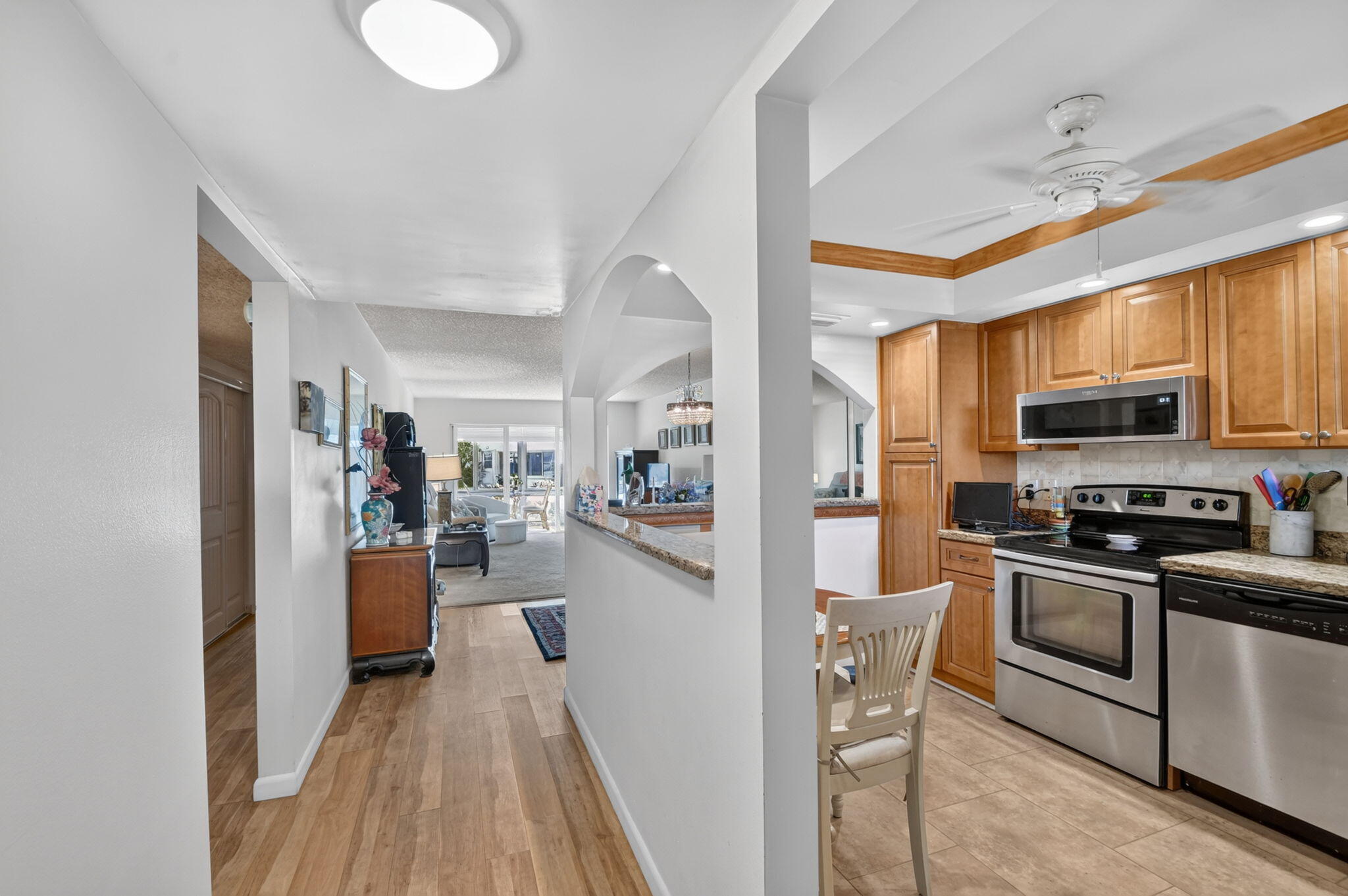 Welcome home to this beautifully maintained first-floor condo offering comfort, convenience, and peace of mind! This move-in-ready residence features a newer AC system (less than a year old), newer water heater (less than a year old), impact windows, and an impact front door for added storm protection and energy efficiency. Enjoy the convenience of an in-unit washer and dryer, custom California Closet storage, and updated bathroom fixtures. Located in a desirable 55+ community with an impressive array of amenities, including a sparkling pool, clubhouse, sauna, library, and fitness center. Whether you're relaxing at home or enjoying the many community features, this condo offers the perfect blend of lifestyle and low-maintenance living. Don't miss the opportunity to make this your new home! Front door and back door impact for added protection.