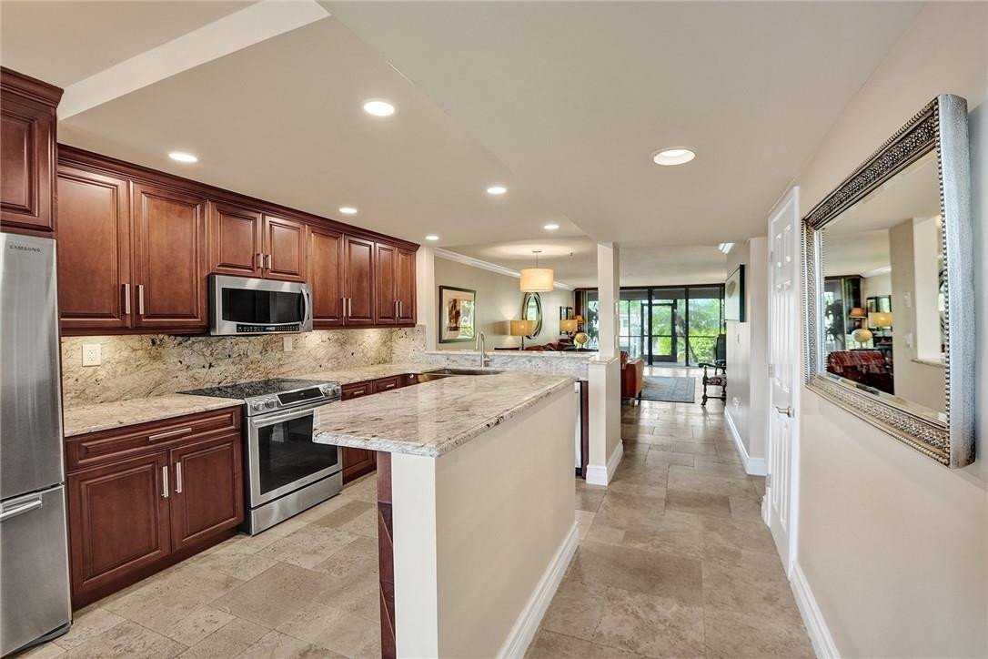 WELCOME TO THIS MOVE-IN READY, FIRST FLOOR, WATERFRONT PROPERTY WITH A PRIVATE DEEDED DOCK IN THE HIGHLY DESIRABLE NOBLE POINT CONDOMINIUM! THIS ONE OF A KIND CONDO FEATURES IMPORTED ITALIAN TRAVERTINE FLOORING, ELEGANT CROWN MOLDING, STAINLESS STEEL APPLIANCES, PRISTINE GRANITE COUNTERTOPS, CUSTOM WOOD CABINETRY, WALK-IN CLOSET WITH BUILT-INS, IN-UNIT WASHER/DRYER AND HUGE SCREENED-IN PATIO WITH GORGEOUS VIEWS OF THE SUNSET GLISTENING OVER THE CANAL. THIS 2 BEDROOM 2 BATHROOM UNIT IS COMPLETELY UPDATED, IN FANTASTIC SHAPE AND HAS BEEN KEPT VERY CLEAN! ENJOY THE HEATED POOL, BBQ GRILLS, TENNIS, PICKLE BALL, AND FITNESS CENTER. PLENTY OF RESIDENT AND GUEST PARKING AVAILABLE FOR YOUR VEHICLES. VERY LOW HOA DUES FOR A WATERFRONT PROPERTY. SCHEDULE A PRIVATE SHOWING TODAY BEFORE IT’S GONE!