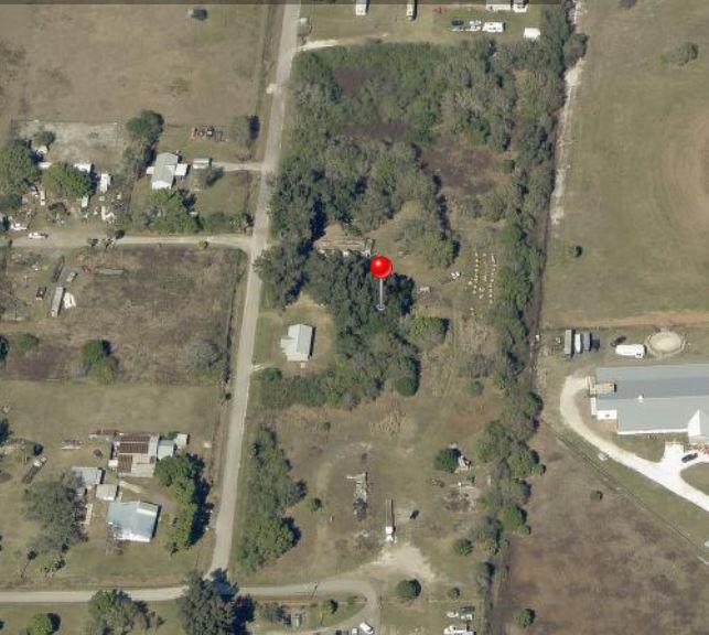 West Sherman~4.22 Acres of Opportunity! Discover the perfect blend of privacy, space, and potential with this beautiful 4.22-acre residential parcel nestled in a quiet neighborhood. Shaded by a rich canopy of mature trees, this property offers a peaceful setting while remaining ready for your vision. The land can be selectively cleared and customized to suit your needs or transformed into grazing pasture for cattle. Featuring multiple access points, two dependable well pumps, utilities already in place, and dirt-filled high-and-dry ground in a No Flood Zone, this property is ready for its next chapter. With no HOA restrictions, you'll enjoy the freedom to create the lifestyle you've always wanted.  Conveniently located in a fast-growing community with easy access to major U.S. highways, this versatile property is ideal for residential, agricultural, or recreational use. Bring your vision to life and make this exceptional acreage your own! Parcels: 1-30-37-36-0010-00030-0100, 1-30-37-36-0A00-00013-0000, 1-30-37-36-0010-00020-0010 Conveyed as a single transaction. Buyer to perform their own due diligence regarding the property future uses. Call today for a Free Tour!