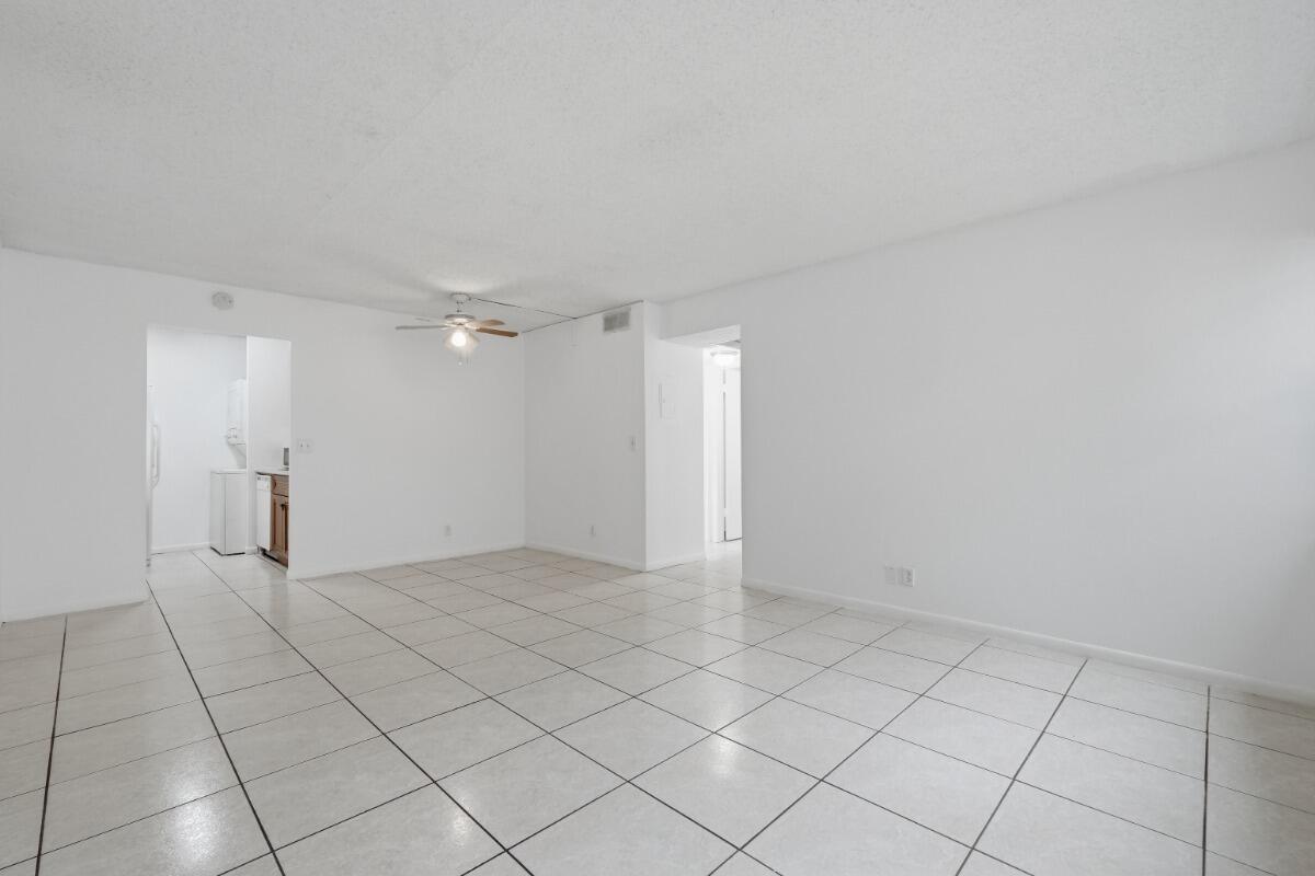 Welcome to this well maintained 2-bedroom, 2-bathroom first floor condo in the desirable Lakewood Village community of Coral Springs. This spacious unit features an open living and dining area, tile flooring throughout, and an in-unit washer and dryer for added convenience. Enjoy a comfortable layout with plenty of natural light and easy first floor access. Residents can take advantage of the community pool and beautifully maintained grounds. Conveniently located near shopping, restaurants, parks, schools, and major highways. Don't miss this opportunity to lease a centrally located home in one of Coral Springs' most sought after areas.