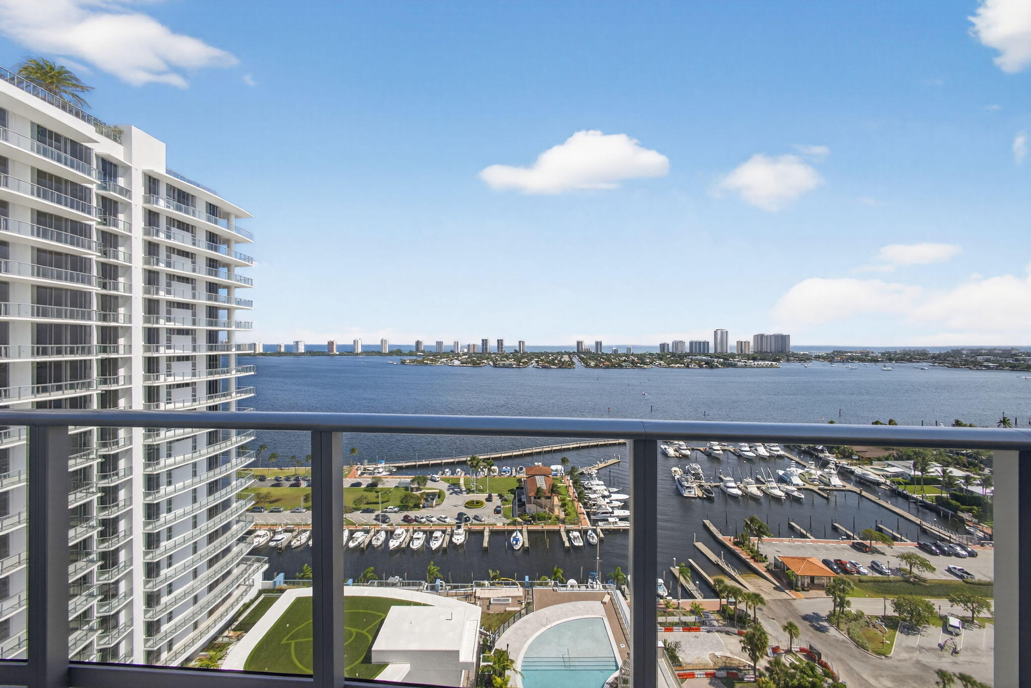 Welcome to a stunning east-facing condo offering luxurious waterfront living at Nautilus 220. This expansive 3-bedroom plus den, 3.5-bath residence is available for immediate occupancy, showcasing breathtaking views of the marina, Intracoastal, and ocean. The thoughtfully designed flow-through floor plan features soaring 10-foot ceilings and hurricane-impact glass, ensuring both elegance and safety. Gourmet enthusiasts will appreciate the Miele appliances, wine cooler, and waterfall quartz island complemented by sleek European cabinetry.The primary suite is a sanctuary of comfort, featuring dual closets, a spa-style bath, and a terrace with east water views. Nautilus 220 is a premier luxury development comprising 330 residences across two 24-story towers, nestled alongside a marina. Residents can indulge in the culinary delights of SeaHawk Prime by David Burke, as well as enjoy the convenience of on-site café, retail, and office suites.The community boasts an impressive array of resort-style amenities on a sprawling one-acre deck, including a pool, spa, fire pits, putting green, yoga deck, dog park, club room, cinema, golf simulator, guest suites, valet, and 24-hour concierge services. Fitness enthusiasts will appreciate the spin and yoga studios, while relaxation awaits in the sauna and steam rooms. Entertainment options abound with bowling, theater, music studio, billiards, card tables, kids' playroom, and teen gaming room. A rooftop lap pool and spa offer 360-degree panoramic views, providing a serene escape. Additional services include 24-hour onsite security and management, electric car charging stations, and guest suites. Residents enjoy exclusive access to waterfront restaurants, retail spaces, offices, café, and a private beach club, making Nautilus 220 the ultimate destination for luxury living. The grand lobby, with its 18-foot ceilings, and amenities areas are masterfully designed by the renowned Interiors by Steven G., ensuring a sophisticated arrival experience. This pet-friendly community is dedicated to providing an exceptional living environment. Discover the epitome of luxury and convenience at Nautilus 220, where every detail is crafted to enhance your lifestyle. Don't miss the opportunity to call this extraordinary residence your new home.
