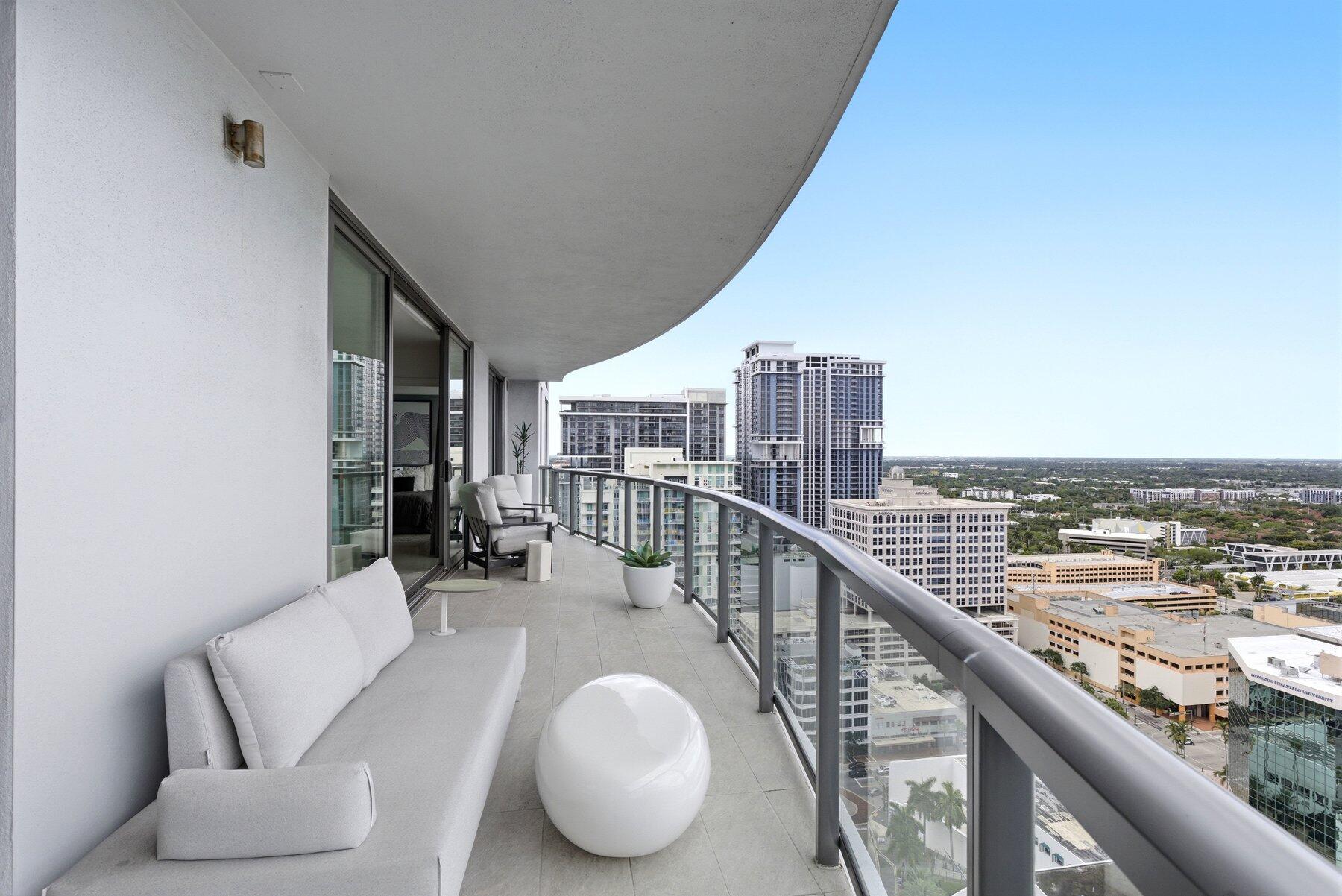 Perched high above Las Olas Boulevard, this designer-decorated furnished turnkey residence at 100 Las Olas delivers breathtaking skyline, ocean, and sunset views through dramatic 10-foot floor-to-ceiling glass. Featuring 2 bedrooms, a den, and 2.5 baths, the home showcases porcelain flooring, motorized shades, SONOS, smart home automation, JennAir appliances, and custom closets. Indulge in five-star resort amenities, valet service, 2 parking spots (1 EV), and a vibrant lifestyle just steps from Fort Lauderdale's premier dining, shopping, nightlife, marinas, and beaches.