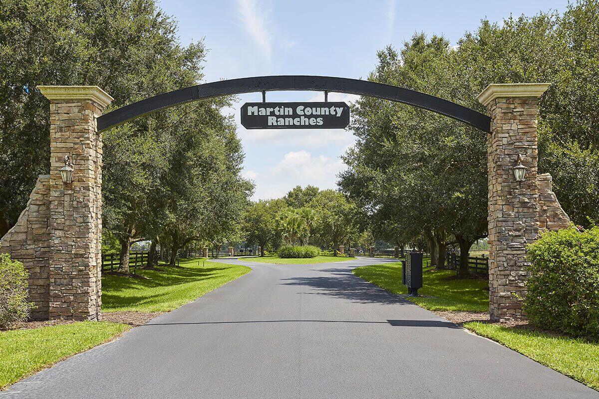 COME BUILD YOUR DREAM HOME ON THIS 20 ACRE HIGH & DRY PARCEL LOCATED IN THE ELEGANT SECURED - GATED EQUESTRIAN COMMUNITY OF MARTIN COUNTY RANCHES . MARTIN COUNTY RANCHES FEATURES GORGEOUS OAK - LINED ROADS AND STUNNING NATURAL VIEWS BOASTING 4.5 MILES OF BRIDAL TRAILS . THIS VERY UPSCALE HORSE AND / OR CATTLE RANCH COMMUNITY IS A HIDDEN GEM IN SOUTH FLORIDA! THIS IS YOUR OPPORTUNITY TO HAVE IT ALL. THERE IS ROOM FOR ALL YOUR RECREATIONAL NEEDS. BRING YOUR CAR COLLECTION , YOUR OFF ROAD TOYS AND YOUR HORSES ! UNDERGROUND UTILITIES AND FIBER OPTIC INTERNET IN PLACE. EASY ACCESS TO I-95 INTERSTATE & THE TURNPIKE . A 45 MINUTE DRIVE TO BEACH AND 1 HOUR TO PALM BEACH INTERNATIONAL AIRPORT.