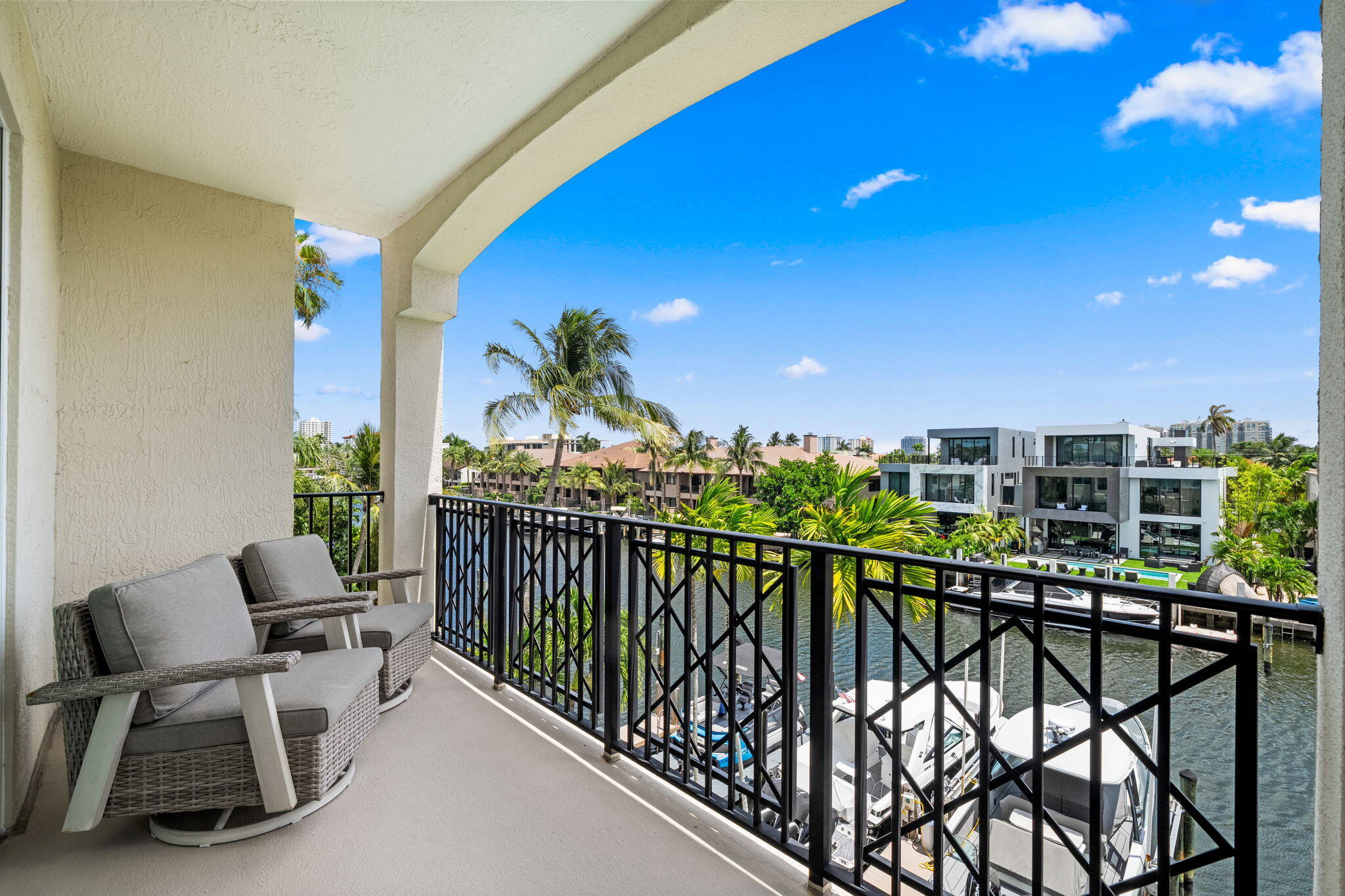 Experience elevated waterfront living in this beautifully appointed Residence at Rio Villas, an exclusive boutique community in the heart of Coral Ridge. This home showcases expansive living spaces filled with natural light and tranquil canal views throughout. Step onto your private balcony and enjoy the serene South Florida waterfront setting. Boaters will appreciate the private dock accommodating up to a 35' vessel with direct ocean access and no fixed bridges. Additional highlights include two garage parking spaces, a waterfront pool, and outdoor grilling area. Perfectly positioned just off Bayview Drive, this location places you minutes from Ft Lauderdale Beach, premier dining, shopping, & top-rated schools. Schedule a private tour today!