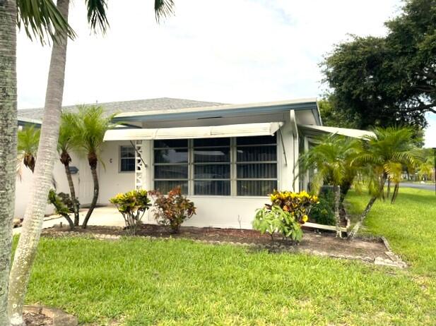 Welcome to this well-maintained 2-bedroom, 2-bath corner villa in a vibrant 55+ community. Offered fully furnished, this inviting home features tile flooring throughout, an Insta Hot water heater, a CAC service contract, and an A/C replaced in June 2018. Enjoy Florida living at its best with access to an array of community amenities, including a large heated resort-style pool, clubhouse, pickleball courts, tennis courts, and shuffleboard, along with a full calendar of planned social activities. Ideally located just minutes from the beach and downtown Delray, you'll be close to quaint shops, open-air cafes, fine dining, shopping malls, theaters, I-95, the Florida Turnpike, and places of worship. Each building, consisting of 4 villas, shares a coin-operated washer and dryer.    All information is deemed reliable but not guaranteed and is subject to change without notice.