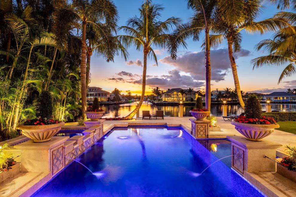 Graced with picturesque water views, private manicured grounds and lavish interior, the gated estate at 2342 South Ocean Boulevard, Highland Beach offers luxury living at its best. Meticulously maintained with incredible direct Intracoastal waterfrontage and No Profile 40,000 pound custom boat lift, features include custom finishes, gold leaf ceiling, library, billiard room, home theater, chef's kitchen and stunning master wing with gorgeous views, master baths and closets. Enjoy outdoor living with private beach access, summer kitchen, covered loggia, glass beaded pool and spa with spacious terrace for relaxing amidst the sunset views. The five bedroom residence offers Smart house technology, generator and four-car garage. Enjoy South Florida's luxurious lifestyle in this private oasis! Ideally located on A1A across the street from multi-million dollar oceanfront homes, this private oasis is located between Delray Beach and Boca Raton's boutiques and eateries and a pleasant drive to Palm Beach and Fort Lauderdale. Boaters will appreciate the close proximity to nearby Boca Raton inlet for adventures on the high seas. Travel is easy with several jetports in the area and three international airports easily accessible via Interstate 95 or Federal Highway. The Town of Highland Beach has its own town hall, library, post office, water plant, fire department and police department that offers patrol service. The town offers first-class services while maintaining a private and serene coastal community for its residents. The eleven residents of Camelot on the Atlantic enjoy the benefit of private gated beach easement which is located just south of the property. Sun and fun are available year-round with both direct Intracoastal waterfrontage and beach access.

The property's gated entry opens to unveil the manicured grounds, decorative driveway and stately double-door entry. The entry foyer provides the first glimpse of the stunning dÃ©cor, scenic pool and fabulous direct Intracoastal views just beyond. Boasting over 11,000 total square feet, the five bedroom residence offers exceptional privacy for relaxing retreats as well as spacious living areas for festive entertaining with stunning water views throughout. Exceptional interior touches include Jerusalem marble floors throughout and custom venetian plaster walls, woodwork and trim. The formal living room is open to the upstairs with a soaring gold leaf detailed ceiling, Biltmore Estate inspired chandelier, intricate custom trim throughout, stone fireplace and a solid wall of windows overlooking the waterway with French doors that lead to the terrace. The paneled library has a fireplace, built-ins and French doors that open to a covered front terrace. The impressive paneled billiard room has a full bar with custom wine storage, powder room and French doors to the pool. The formal dining room overlooks a charming fountain and walking path on the north side of the house. There is a 300-bottle wine cellar nearby for maximizing the culinary experience. The chef's kitchen features SubZero, Asko and Wolfe appliances, double island with snack bar, a butler's pantry with Wolfe wall oven and warming drawer and a dining area that opens to the family room. The inviting family room has French doors that lead to the covered loggia allowing the fun to flow effortlessly outdoors. The home theater will enhance any viewing with 120 inch screen and hidden projector, stadium seating and custom lighting and controls. The ground floor laundry room, back stairway and large understair storage closet are all located on the service hallway between the four-car garage and kitchen.

The grand stairway gracefully leads to the second floor which overlooks the pool, waterway and opens to the formal living room below. The master wing provides a sumptuous retreat with a spacious master bedroom with sitting room and private balcony overlooking the waterway and grounds. There are dual master baths; one with steam shower, custom closet and water views; and the other master bath with morning bar, soaking tub, custom closet with island, and water closet with commode and bidet. The east guest bedroom has a large shower, walk-in closet and balcony overlooking the front grounds. The west guest bedroom has a walk-in closet and balcony overlooking the pool and waterway. The northwest guest wing can be accessed via the main stairway or back stairway and offers a private guest quarters with morning bar and an additional bedroom with Murphy bed. The upstairs laundry room has full-size Bosch washer and dryer.

The pristine grounds with exterior stone paver walking paths are flawlessly landscaped to provide the perfect backdrop from every vantage point. The covered loggia overlooks the pool and waterway and offers a summer kitchen with plenty of room for outdoor living and dining area. The heated saltwater glass beaded pool with spa is perfectly framed by the spacious terrace for watching the sunsets. Enjoy sun and fun with private beach access across A1A. With 99 feet of direct Intracoastal waterfrontage and the Boca Raton inlet nearby, the nautical options are limitless. Experienced boaters will appreciate the cutting edge 20 foot by 60 foot No Profile custom 40,000 pound boat lift. 

The residence offers five bedrooms, five full baths and two half baths with 8,460 square feet under air and 11,013 total square feet. Meticulously maintained to include several upgrades and improvements by the owner, the property is loaded with convenient features including impact windows and doors, generator, Control 4 technology, elevator, six air-conditioner zones, central vacuum, two large hot water heaters, public water and sewer, natural gas, two gas fireplaces, storage and four-car air-conditioned garage.

This property combines the very best details and finishes with stunning water views to create the perfect South Florida luxury residence to call home.