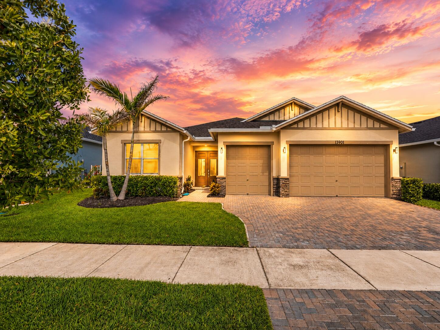 Welcome home to Veranda Preserve, one of Port St. Lucie's desirable 55+ resort-style communities! This beautiful lakefront Summerville floor plan offers 3 bedrooms, a den, 3 full bathrooms, and a spacious 3-car garage, providing the perfect blend of comfort, privacy, and flexibility. Designed for easy Florida living, this one-story home features a bright open-concept layout with peaceful lake views, updated flooring throughout, impact-resistant windows and doors, 8' doors, crown molding, upgraded ceiling fans, elegant crown molding, and a stunning double-glass front entry door. The modern kitchen is perfect for entertaining with quartz countertops, stainless steel appliances, Upgrades include pavers, gutters, exterior stone accents, and an epoxy-finished garage floor.  Every detail has been thoughtfully selected to keep the home light, elegant, and move-in ready. Veranda Preserve residents enjoy a true resort-style lifestyle with a beautiful clubhouse, resort pool, fitness center, pickleball, tennis, bocce ball, and more! All with a low HOA. Why wait to build when you can start enjoying this upgraded lakefront home today. Schedule your private showing and experience the comfort, quality, and lifestyle this home has to offer!