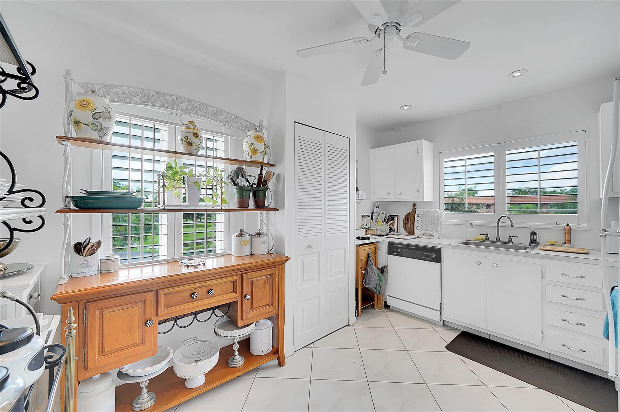 55+ COMMUNITY, UNIT IS ON THE 3rd FLOOR, CORNER UNIT, WELL KEPT BUILDING #129.   BRING YOUR BUYER LOOKING FOR TRUE VALUE. TOP FLOOR CORNER LUXURY MODEL WITH HURRICANE SHUTTERS AND  IMPACT WINDOWS. ENJOY THE LAKE AND GOLF VIEWS FROM THE ENCLOSED PATIO.  UNIT IS ON THE 5TH HOLE OF THE GOLF COURSE.  ALL ASSESSMENTS PAID IN FULL. TILE AND CARPETING THROUGHOUT.  IT IS LOCATED RIGHT NEAR  A SATELLITE YEAR-ROUND HEATED POOL, SAUNA, BILLARD, TENNIS AND PICKLEBALL COURT.  BY APPOINTMENT ONLY. NO SHOWINGS AFTER 6:00 P.M. OWNER OCCUPIED. ASSOCIATION REQUIRES $3000 A MONTH NET INCOME AND 700 CREDIT SCORE.