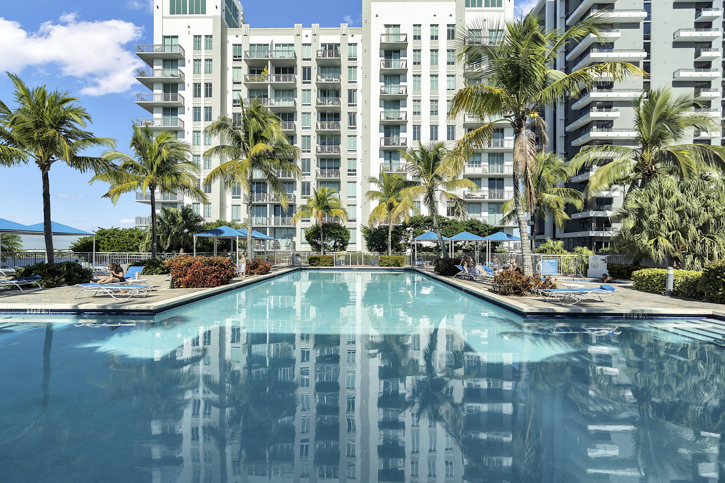 Welcome to the famous Edge! West Palm Beach is quickly becoming South Florida's answer to the live-work-play lifestyle New Yorkers love — with luxury development, vibrant downtown energy, waterfront dining, and Brightline convenience. This two bedroom two bath condo with 10 foot ceilings is located in the sweetest spot of the building just steps away from the pool! All new appliances. Unit features a private garden terrace wrapped in greenery and palm trees for privacy! Luxury amenities include 24 hour attended lobby and security| heated pool| pool cabanas|fitness center| business center| billiard room and lounge areas. Walkable living:  Downtown  nightlife and CityPlace. Beach 10-12 minutes away. Pet Friendly! Monthly rentals allowed. Great investment property for the savvy buyer!  Cleveland Clinic coming within walking distance, make this a rare and appreciating investment. Lease 12x/year, pet-friendly, water & internet included.