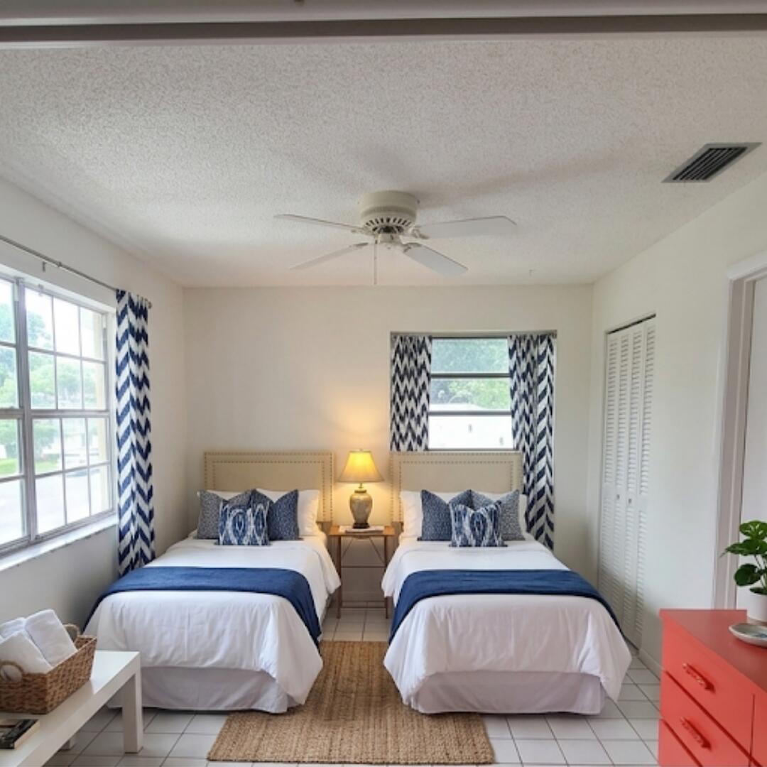 Beautifully maintained 2-bedroom, 2-bathroom corner unit in desirable Palm Greens at Villa Del Ray. Located on the second floor, this bright condo features a split-bedroom floor plan, washer and dryer in unit, and is offered fully furnished. Enjoy abundant natural light and a convenient location just steps from the community's resort-style clubhouse and amenities. Move-in ready!