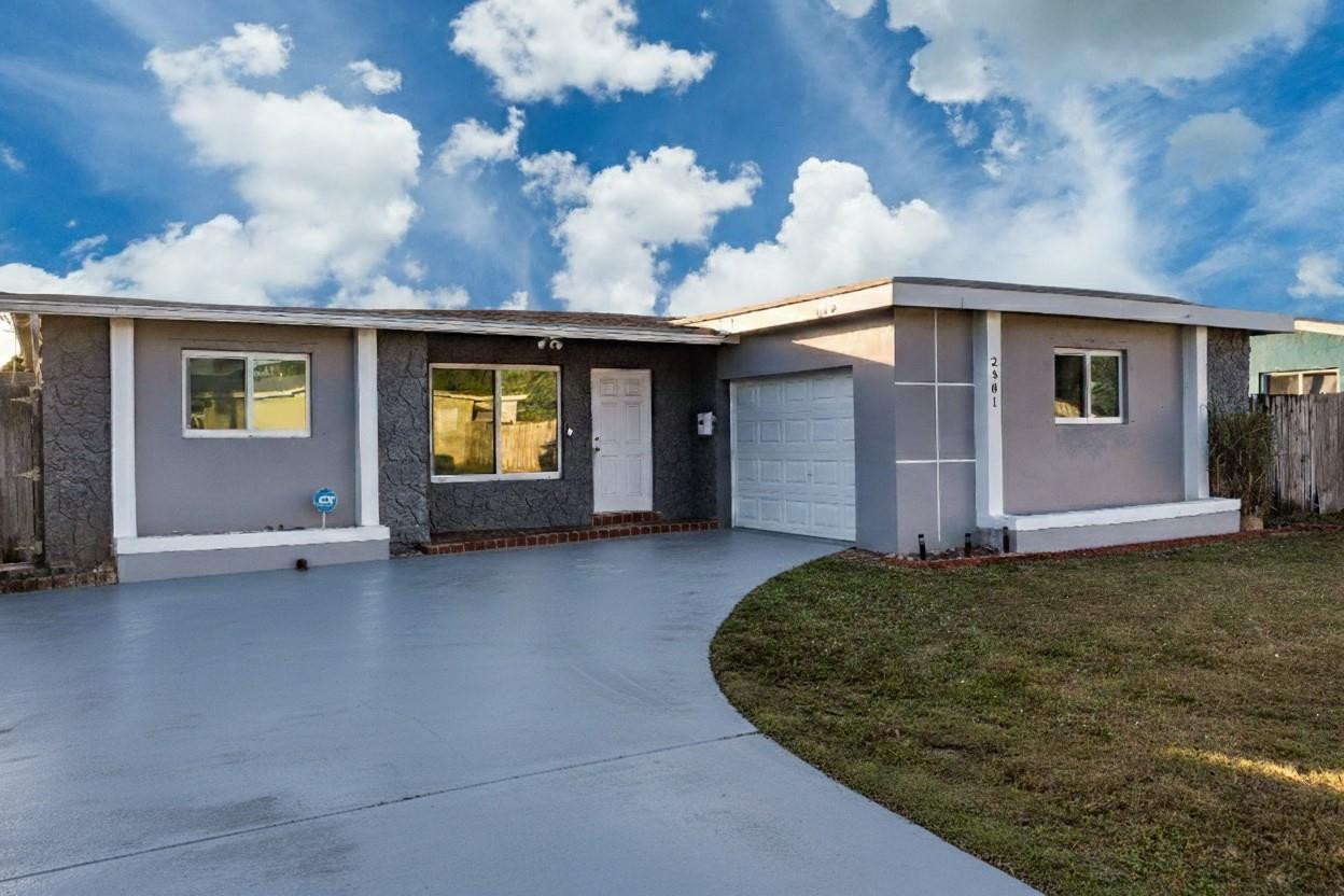 Beautifully updated home with major upgrades throughout, including a primary bath fully renovated 2 yrs ago. Features impact windows & impact-rated garage door for added security, zebra blinds throughout (2021), updated fans (2020) & sleek track lighting (2020) in the Florida Room, which offers flexible use & potential 3rd bedroom/office/bonus space. Kitchen includes SS appliances (2020), except W&D. Key updates: Roof 2020, AC & HVAC 5/2023, WH 11/2017. Spacious backyard with room to entertain or add a pool, plus a brand-new covered northside patio with LED lighting. Backyard shutter easily removable & shed already removed. Elevated semi-circular driveway offers ample parking & does not flood. Move-in ready with comfort, upgrades & versatility. Check out the video walk through tour!! Will not last!!