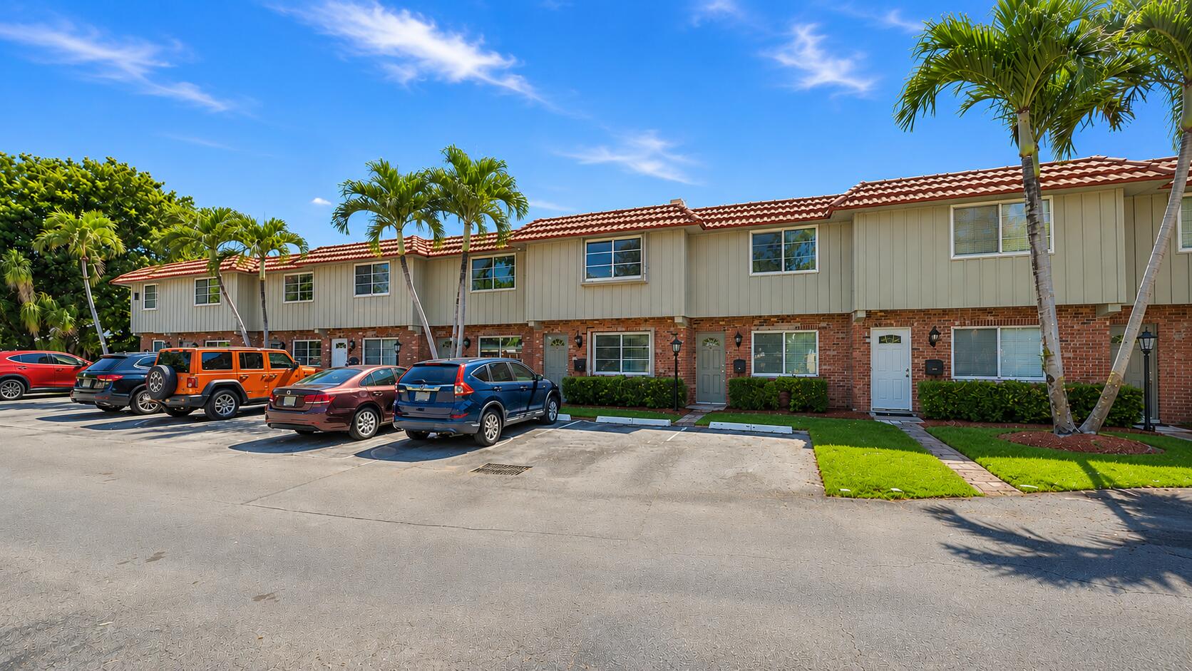 Opportunity awaits in the heart of Wilton Manors. This 2-bedroom, 1.5-bath townhouse features brand new full hurricane impact windows and doors throughout, a newer AC system, newer appliances, a new fence, fresh interior paint, and an in-unit washer and dryer. Recently updated units in this same community have sold in the mid-$300s, offering great potential for value appreciation with the right upgrades and making this the perfect opportunity for the savvy buyer or investor looking to remodel and make it their own. The layout is comfortable and functional. The main level features an open living and dining area, a half bath with a large closet perfect for storage, and direct access to a private fenced patio ideal for outdoor dining or a quiet retreat. Upstairs you will find two generously sized bedrooms with ample closets and a full bath. What truly sets Manor Grove apart are its spectacular natural green spaces, creating a serene, pet-friendly environment with incredible outdoor areas to roam and explore within the secure, beautifully maintained community. Residents can have up to two dogs with no weight or breed restrictions, and the location is hard to beat. Seven-minute walk to Wilton Drive, minutes to downtown Fort Lauderdale, and less than 4 miles to the beach. One assigned parking space plus guest parking. Water, sewer, trash, and roof repairs are all included in the monthly HOA fee.  This light and inviting home is ready for your personal touch. Whether you are an investor looking for strong upside or a savvy buyer ready to build equity in one of South Florida's most desirable cities, this is the opportunity you have been waiting for.