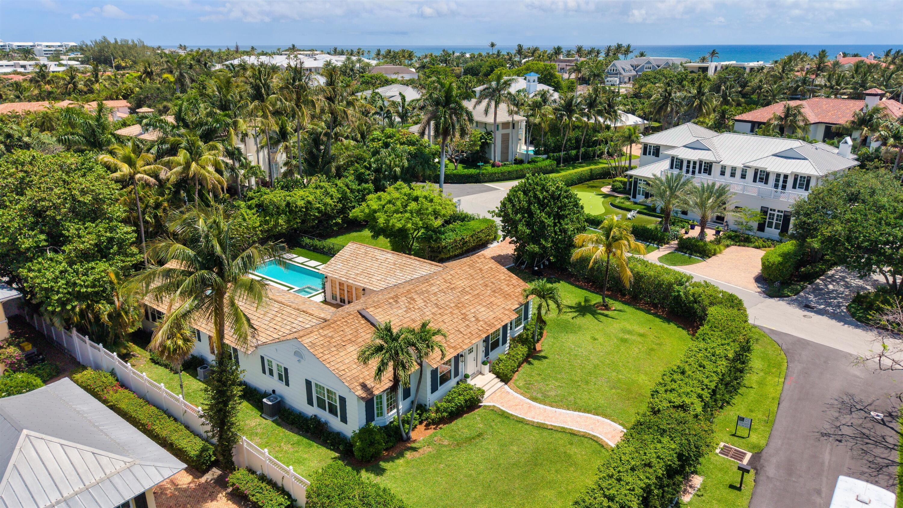 Just one block from the beach and a short stroll to Atlantic Avenue, this one-of-a-kind residence sits on the 3rd largest corner lot in the prestigious Seagate Neighborhood. Turn key move in ready with a comprehensive renovation completed including new pool, spa and outdoor entertainment area.  Originally built in 1948, it is one of the few remaining Old Florida charm homes — now brought back to life through a painstaking three-year renovation led by the award-winning Chris Leighton Design Group. The result is a timeless masterpiece that blends classic soul with modern luxury.  Designed for both intimate living and large family gatherings, the home centers around a French-country kitchen with a massive center island, formal dining room, and expansive living/family room. A natural stone fireplace offers cozy evenings indoors, while the Brazilian teak deck provides the perfect outdoor retreat amid lush, mature landscaping. The layout offers exceptional privacy with four ensuite bedrooms, including a master oasis with a spa-like bath. Sunlight streams through impact windows and doors, creating a seamless indoor-outdoor experience. This is more than a home   it's a rare piece of history reimagined for modern living, ready to captivate your heart and feed your soul.   The information herein is deemed reliable and subject to errors, omissions or changes without notice.  The information has been derived from architectural plans or county records. Buyer should verify all measurements  DISCLAIMER: Information published or otherwise provided by the listing company and its representatives including but not limited to prices, measurements, square footages, lot sizes, calculations, statistics, and videos are deemed reliable but are not guaranteed and are subject to errors, omissions or changes without notice. All such information should be independently verified by any prospective purchaser or seller. Parties should perform their own due diligence to verify such information prior to a sale or listing. Listing company expressly disclaims any warranty or representation regarding such information. Prices published are either list price, sold price, and/or last asking price. The listing company participates in the Multiple Listing Service and IDX. The properties published as listed and sold are not necessarily exclusive to listing company and may be listed or have sold with other members of the Multiple Listing Service. Transactions where listing company represented both buyers and sellers are calculated as two sales. "No payments made until title passes" Some affiliations may not be applicable to certain geographic areas. If your property is currently listed with another broker, please disregard any solicitation for services. Information published or otherwise provided by seller, listing company or its representatives is deemed reliable but are not guaranteed and subject to errors, omissions, or changes without notice. Copyright 2026 by the listing company. All Rights Reserved.