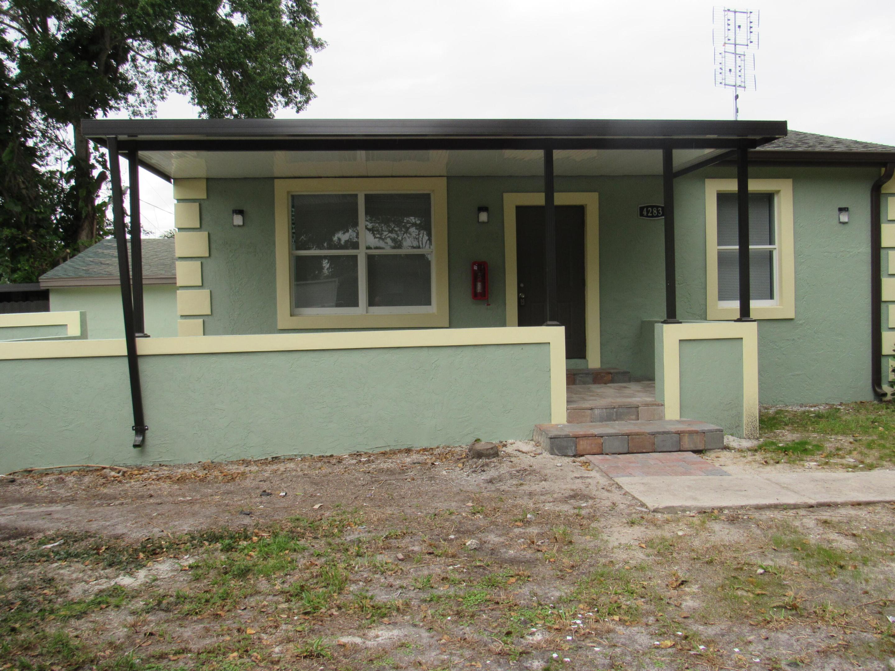 Freshly painted 3 bedroom, 2 bathroom Home, laminated flooring throughout, covered porch, front patio, close to City Place and beaches. No pets allowed