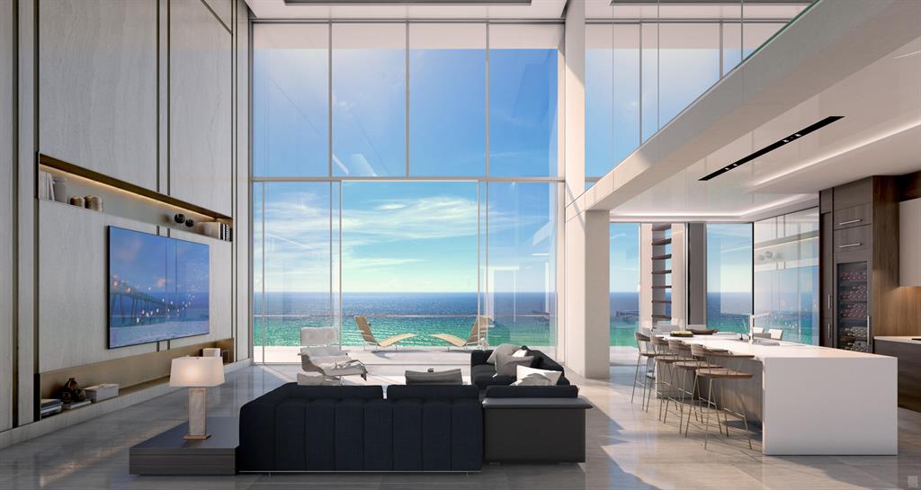 Prestigious island address. Stunning ocean & Intracoastal views. Incomparable lifestyle. With the scarcity of Florida coastline, we proudly introduce a new oceanfront residence tower featuring over 340 ft. of direct beachfront on 4 ½ acres of natural habitat and sandy dunes. Discover 5000 North Ocean's unprecedented coastal lifestyle rising 19-stories above the ocean in Singer Island's coveted north residential corridor just minutes from everything PGA Boulevard has to offer. At 5000 North Ocean you'll awaken to awe-inspiring sun rises over the horizon and the soothing sounds of waves rolling onto pristine sands. Expansive walls of glass, innovative architectural designs and crisp modern interiors combine to create an unprecedented coastal lifestyle with a host of private residential services. And as the day draws to a close, you'll marvel at the spectacle of a Palm Beaches sunset. This extraordinary already under construction opportunity is scheduled for occupancy, Fall 2019.

The unique floorplan of the two-story Seaglass residence provides stunning oceanfront views through soaring walls of glass that rise to nearly 20ft. in height. Step off the access-controlled elevator into your own private vestibule. This great room floor plan offers 4 spacious Bedrooms, Family Room, and 4.5 Baths, soaring 9'10" ceilings with full height sliding glass doors and windows. Multiple oversized terraces with glass panel rails, add a welcoming outdoor living area with unobstructed water views. The designer kitchen features European style cabinetry available in a choice of finishes, the latest storage systems & integrated LED lighting. Quartz countertop with full-height backsplashes & large islands with waterfall edges. Thermador appliance collection, with 30' refrigerator column & 18" freezer column & Ice Drawer, gourmet 5-burner gas-cooktop with 36" retractable stain-less steel canopy hood, under-counter microwave drawer and Wine Cooler & beverage Center. Laundry Room with upper & lower European cabinets and large capacity Electrolux front load washer & dryer. Ultra, highspeed connectivity for easy custom home automation. Beautifully finished and delivered furniture-ready with an abundant choice of designer coordinated selections. The amenities of 5000 North Ocean offer sophisticated luxury living, oceanfront fitness center and resort-style pool.