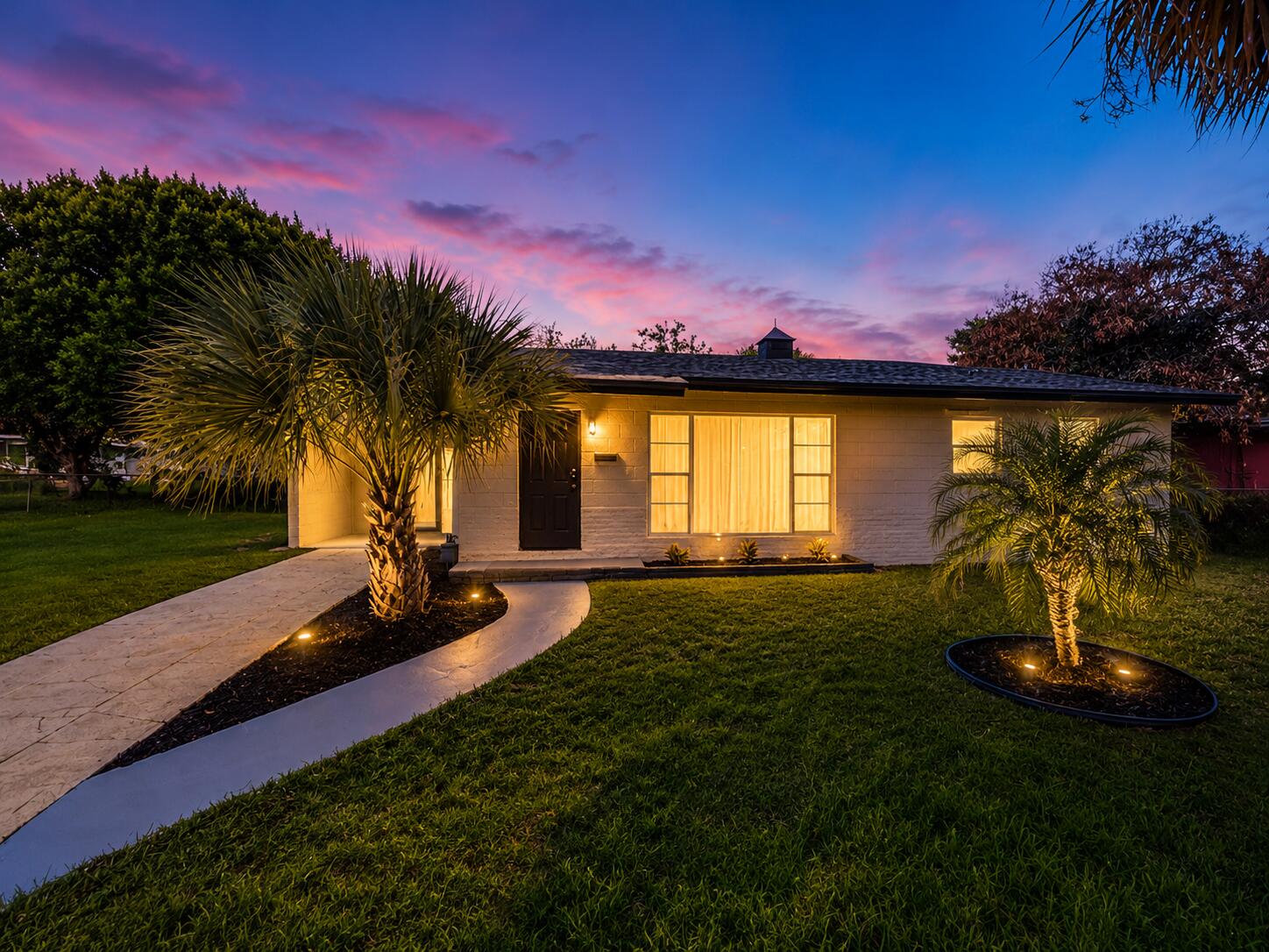 DOUBLE LOT! Stunning fully renovated home on a rare double lot of 12,650 SF  NO HOA! Move-in ready featuring a 2021 roof, brand-new ceramic tile flooring, new drywall, interior doors, baseboards and moldings throughout. The beautifully updated kitchen impresses with quartz countertops, while both bathrooms shine with luxurious modern finishes. New wall AC units, insulated ceiling, tankless water heater and updated electrical outlets ensure year-round comfort and efficiency. Covered carport with ample space for boats, RVs, trailers and all your toys. Located just minutes from Fort Pierce Marina, vibrant downtown dining, beaches, shopping and restaurants. Easy access to I-95 and US-1. A rare Treasure Coast opportunity for homeowners and investors alike — schedule your private showing today!