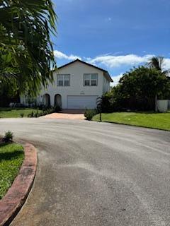 Nicely renovated 2 story home, with the downstairs level displaying an open floor plan, with a Modern Farmhouse feel.  The walls tastefully sport shades of grey and white neutral colors, which complement the
flooring throughout the home. The family room has French doors that lead to a covered porch that has a bed swing and built-in BBQ. The homes 0.3887 Acrea lot boasts a pool with heated spa, a fire pit area and various fruit trees. The 2nd floor houses the 3 bedrooms and 2 bathrooms. The half bathroom is conveniently located on the ground floor to provide privacy.  The Master bedroom along with its personal bathroom, has a door that leads to a balcony with a view of the garden, the canal, and surrounding area. It can accommodate a small table and chairs for relaxing moments.