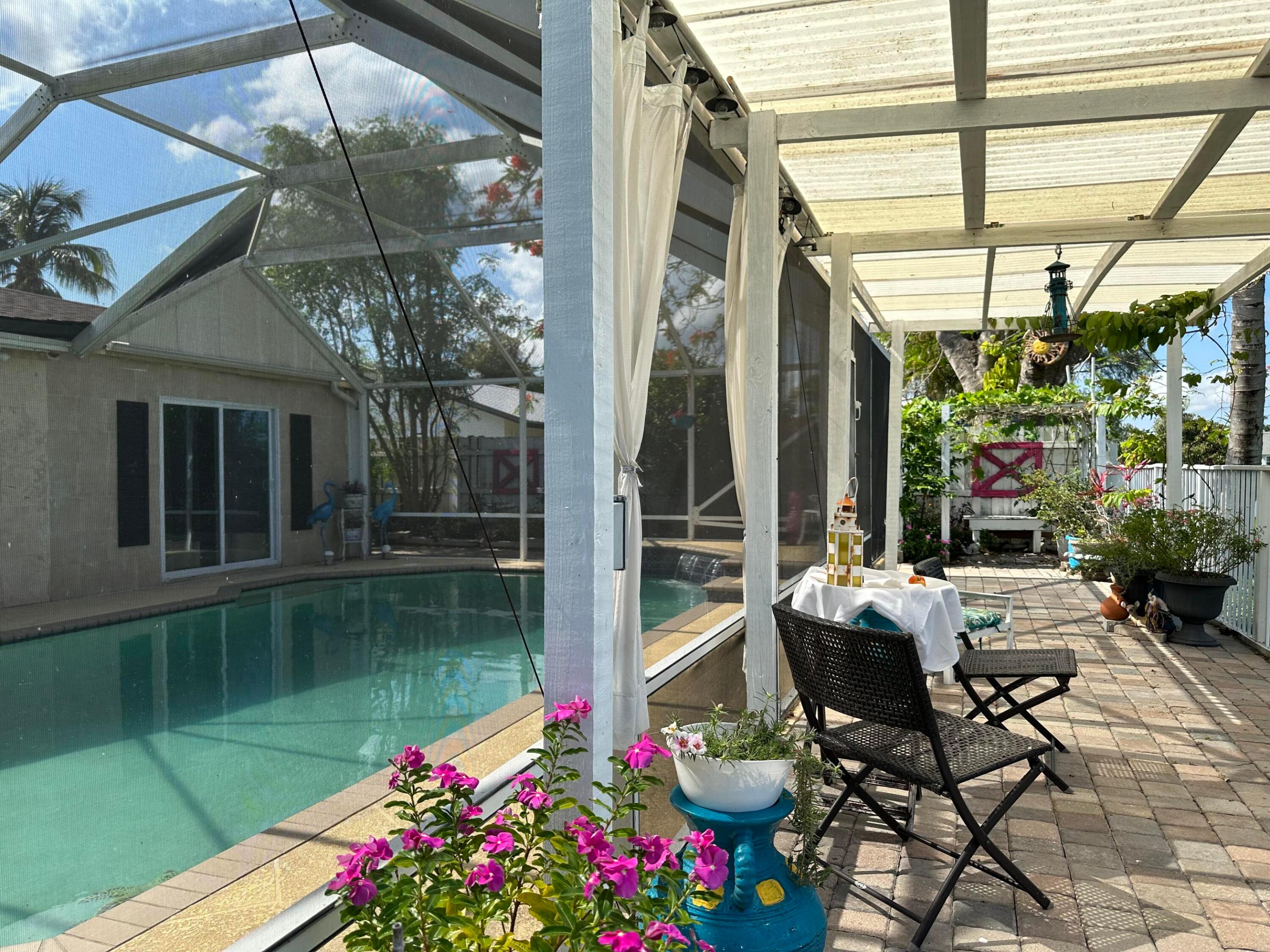 Part of a single family home efficiency ideal for one person with a private entry. Tile flooring, updated bath, refrigerator, cooktop, microwave oven and walk in closet. Water, electricity and cable included in rent. enjoy private pool with a serene lake view in a quiet neighborhood. Ideally located close to shopping and dining.