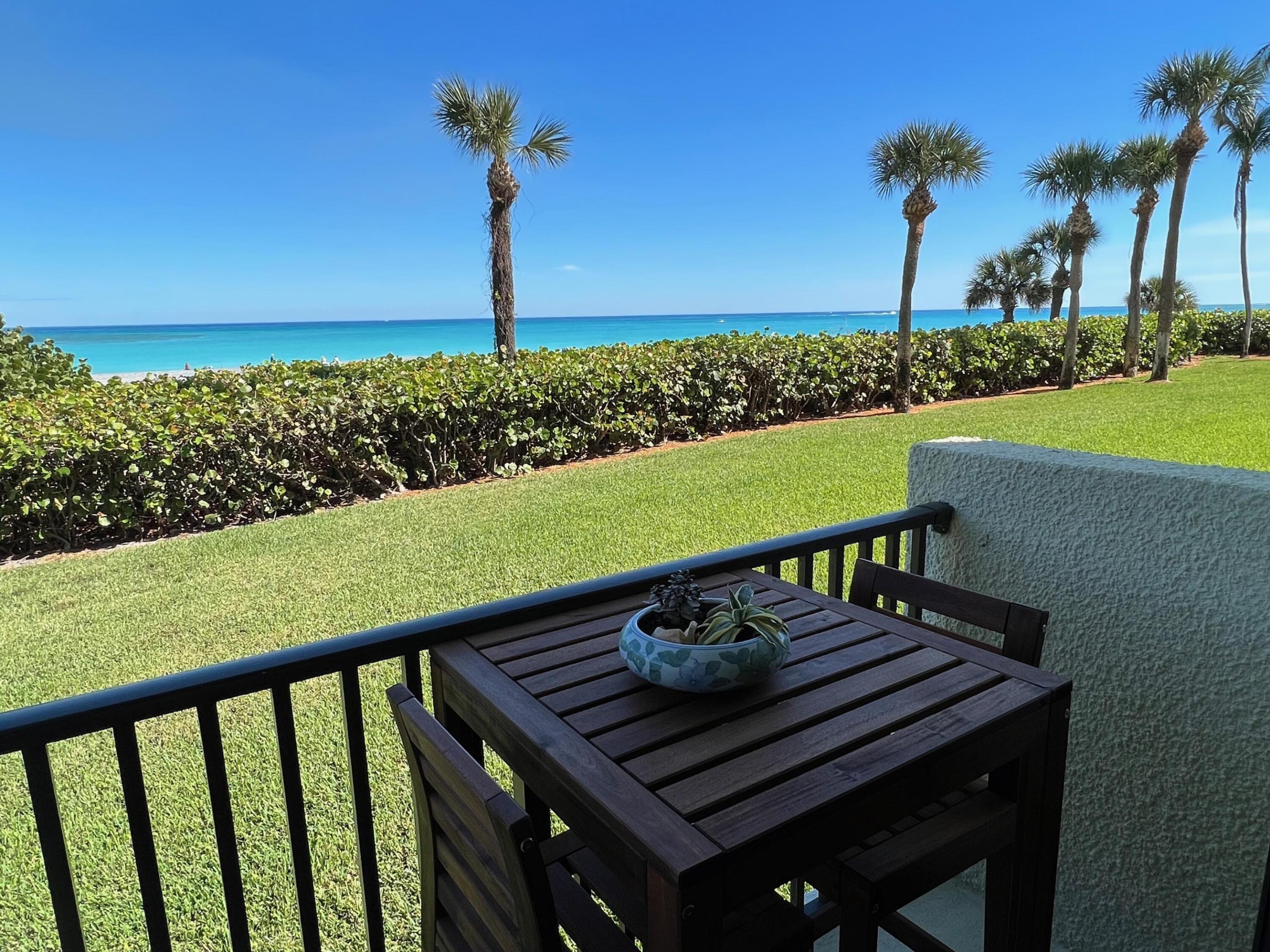 Step off your terrace onto the sand. Ground-floor end unit with walk-out beach and pool access, no elevator. Oversized private terrace, two ocean-view balconies, and covered porch, more outdoor living space than virtually any unit at Ocean Trail, all facing the Atlantic. End-unit positioning brings extra windows, cross-breezes, and unobstructed ocean views. Hurricane impact glass throughout for quiet and storm-season peace of mind. The only Jupiter condo east of A1A, no streets to cross to the sand. Resort amenity package completes 2027: heated pools, hot tubs, sauna, fitness center, tennis, beach paths. Assessment mostly paid, $10K remaining. Quarterly $4,253 COA plus $793.25 POA. Includes all utilities except electric, gated entry, garage parking, insurance, reserves.