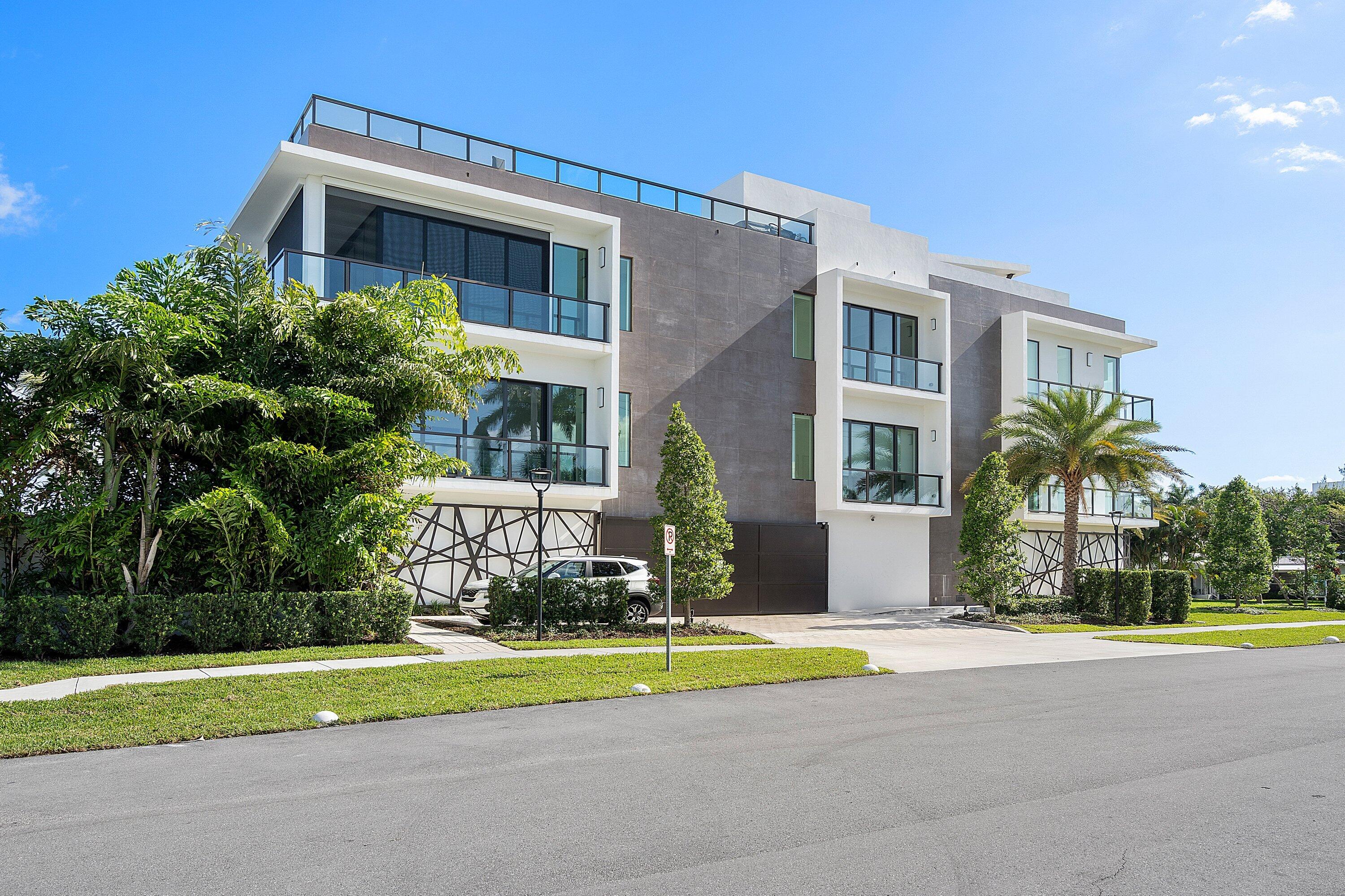This exceptional waterfront residence at 344 Venetian Drive in Delray Beach offers luxury Intracoastal living in a boutique building with only four residences. Located just steps from Atlantic Avenue and Delray's beautiful beaches, this second-floor condo features a private 45' dock and a private rooftop lounge with summer kitchen, perfect for entertaining while enjoying stunning water views. The spacious 3-bedroom, 3.1-bath home offers 3,369 total square feet with a beautifully designed kitchen featuring state-of-the-art appliances, ample storage, and elegant tile and wood flooring throughout. Floor-to-ceiling glass doors fill the bright great room with natural light and open to a balcony overlooking the Intracoastal. Residents also enjoy a waterside pool, private cabana, two garage space