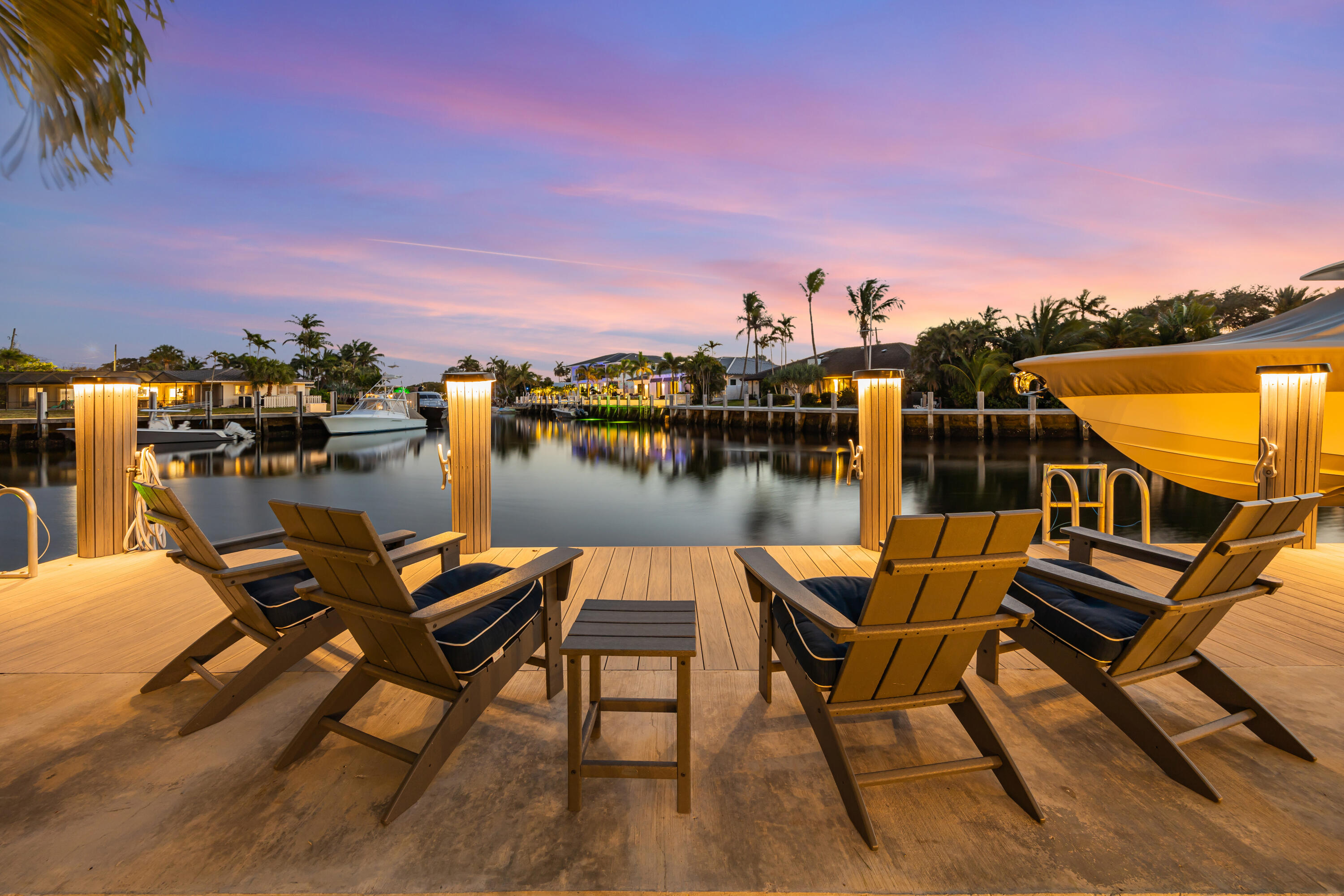 Introducing The Commodore's Boathouse in the desirable Cove enclave of East Deerfield Beach, sited on 90' of deep water frontage with picturesque southern long water views at an intersecting turning basin on the extra wide Kingfisher Waterway. This fully furnished exceptional estate offers 3 bedrooms and 3 full bathrooms with 3,000+/- square feet of total space. Outdoor entertainment is enjoyed under the expansive screened-in porch. Amenities include a resort-style heated & chilled pool, updated interiors, impact windows/doors, and more. Conveniently walkable to Deerfield Beach Pier & nearby world-class restaurants. Available now through August 2026. Fully furnished, including utilities, landscaping, housekeeping and pool service. Minimum of 30 days with dock and boat lift options.