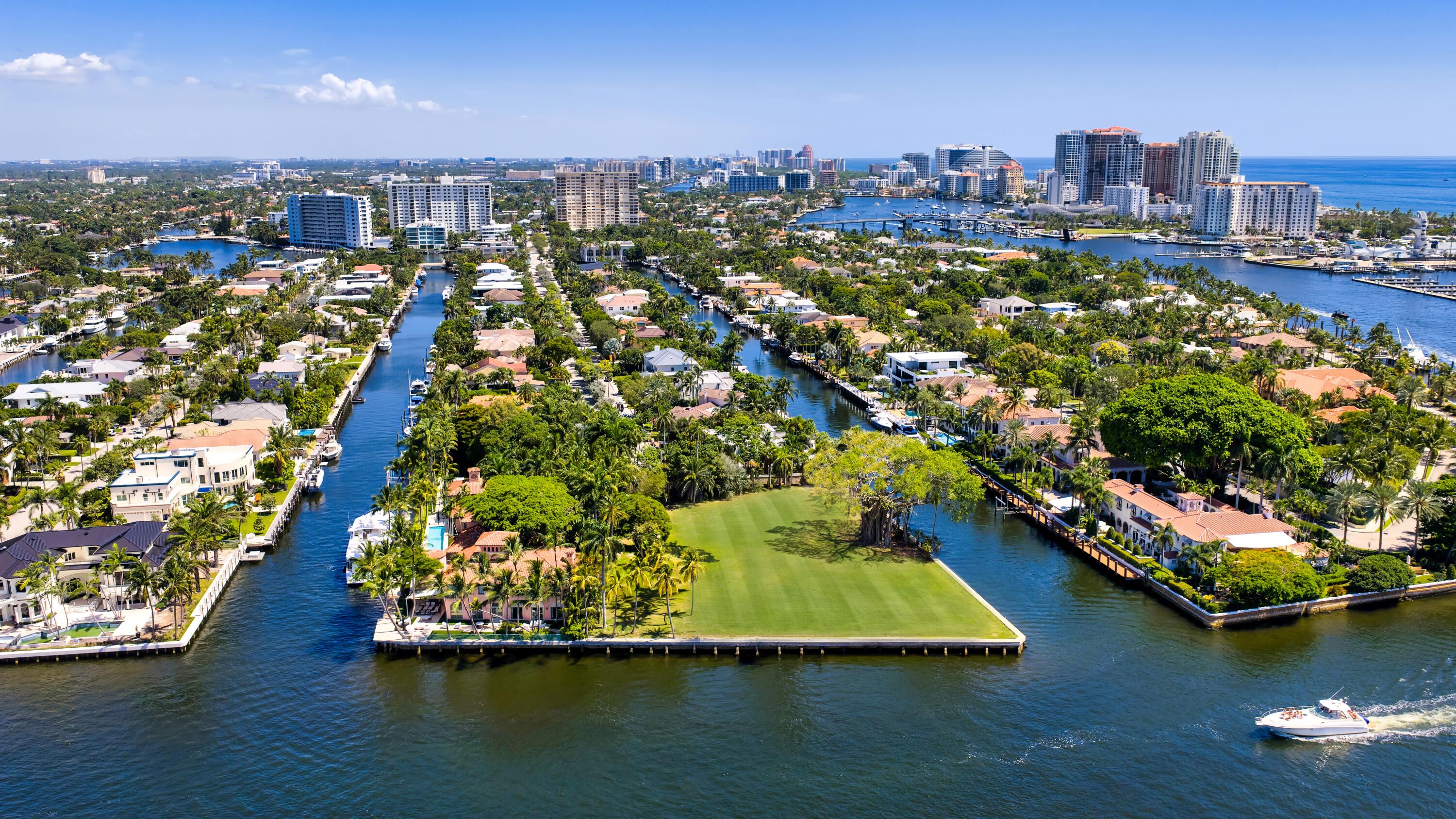 "Banyan Point Estate" located off prestigious Las Olas Blvd. in the guarded Riviera Isles waterfront enclave and sited-on 1.21+/- acres of vacant deepwater point lot with amazing 520 +/-feet of frontage (302+/- ft of protected mega-yacht side dockage) on the Rio Idlewyld Canal and New River/Intracoastal Waterway, minutes to Port Everglades Inlet via Atlantic Ocean. Once owned by the famed Anheuser-Busch family, this iconic point lot cannot be replicated at this price. This Billionaire's Point is ready to build your dream estate with stately main manor house, guest/carriage house, auto salon/gallery and sports/wellness wing and more. Proposed conceptional plans by Palm Beach builder Mark Timothy Luxury Homes and award-winning Affiniti Architects soon to be unveiled. Shown by appt only